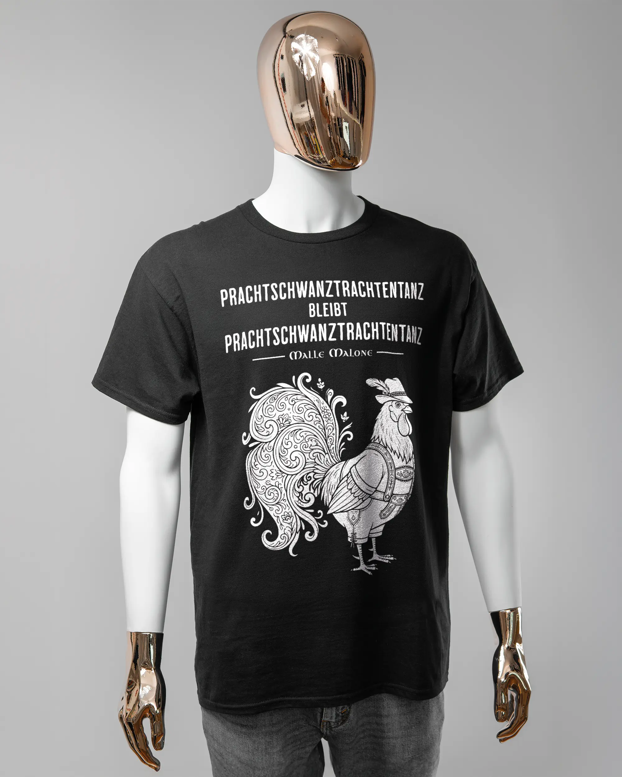 Vorderseite des Basic Unisex T-Shirt Regular von Maondo mit dem Design Trachtentanz in der Farbe Black und in der Größe L getragen von einer maskulinen Puppe
