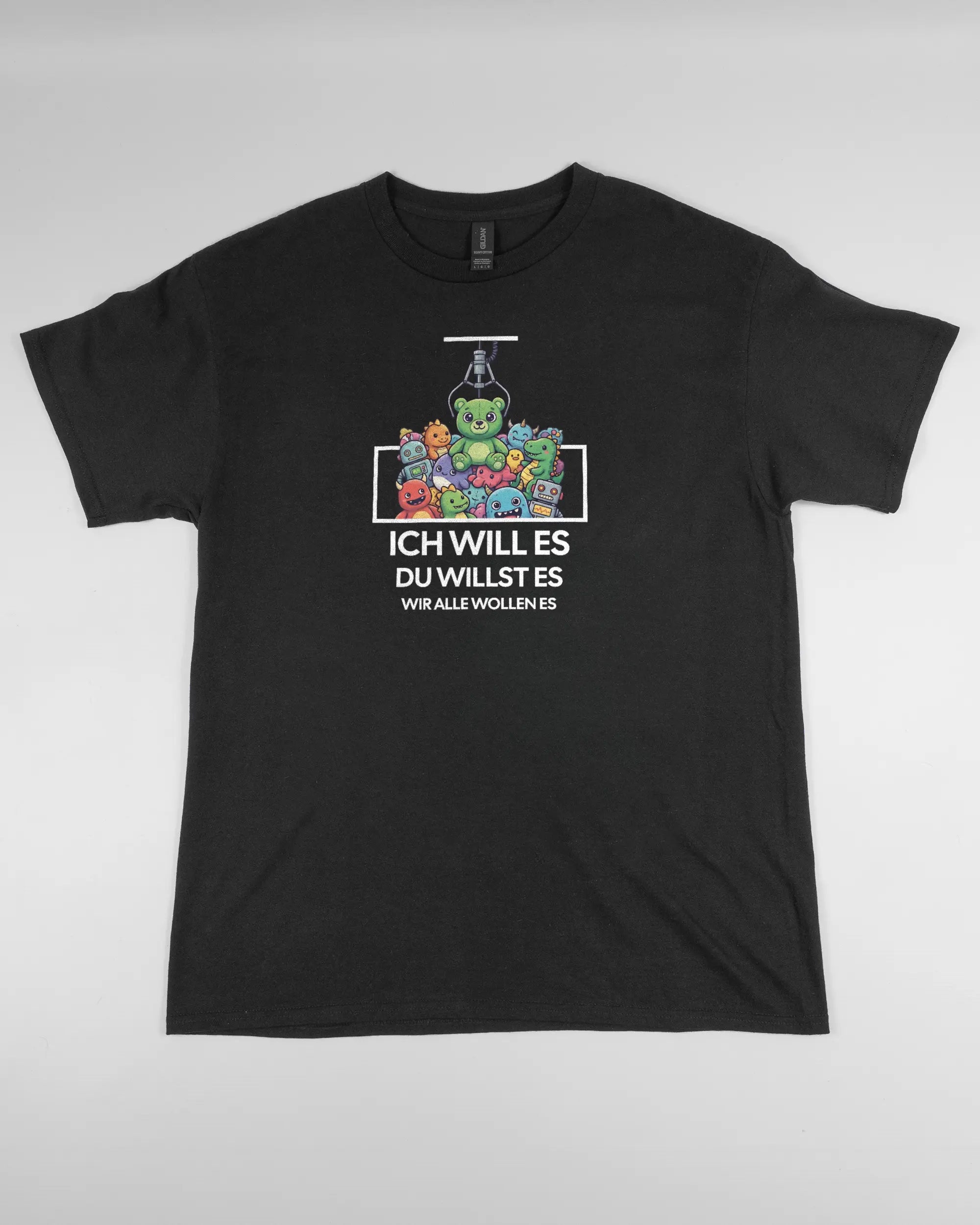 Vorderseite des Basic Unisex T-Shirt Regular von Maondo mit dem Design Will Stofftier in der Farbe Black und in der Größe L flach auf den Boden gelegt