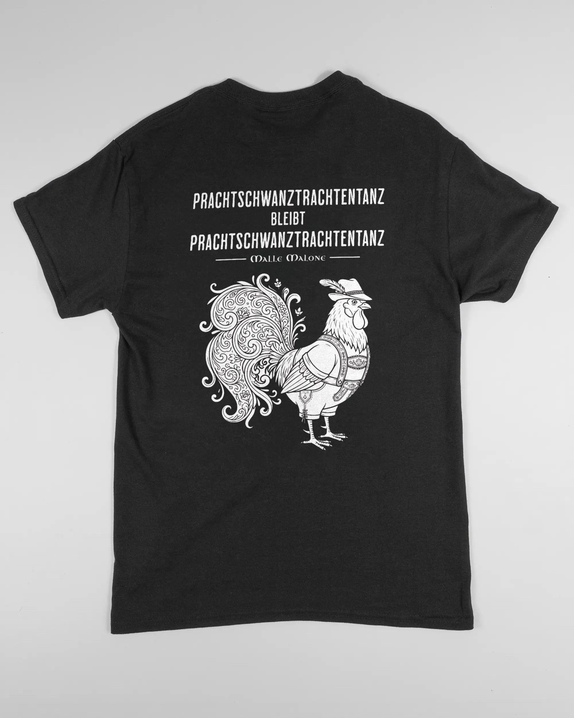 Rückseite des Basic Unisex T-Shirt Regular von Maondo mit dem Design Trachtentanz in der Farbe Black und in der Größe S flach auf den Boden gelegt