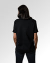 Sekundärer Modelshot der unbedruckten Seite des Organic Unisex T-Shirts von Maondo im Casual Fit mit dem Design Einfach Anfangen in der Farbe Black