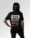 Weiblicher Modelshot der sekundären Druckseite des Organic Unisex T-Shirts von Maondo im Casual Fit mit dem Design Authentic Shit in der Farbe Black