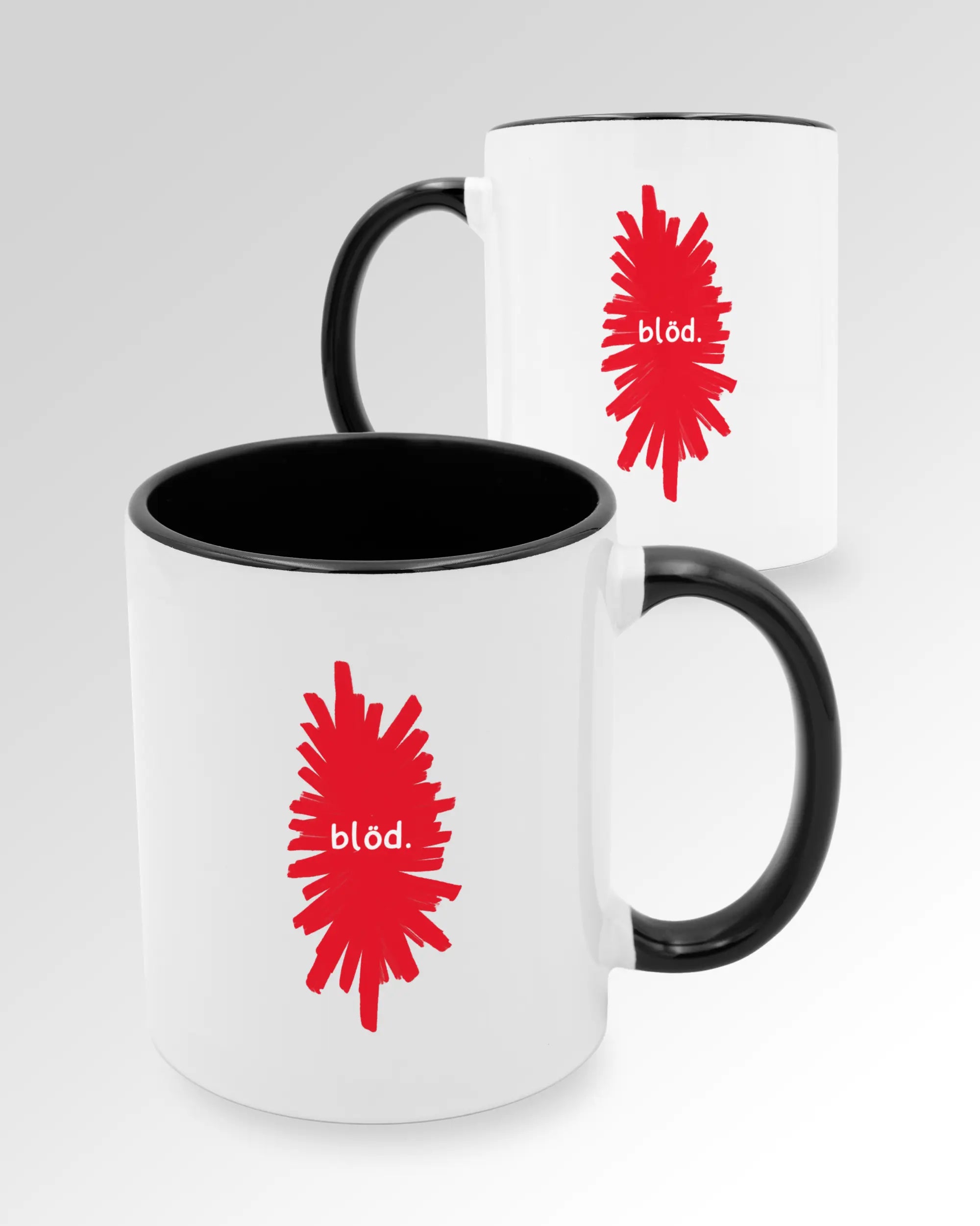 Variantenbild der beidseitig bedruckten Keramik Tasse von Maondo mit dem Design Blöd in der Farbe Schwarz-Weiß