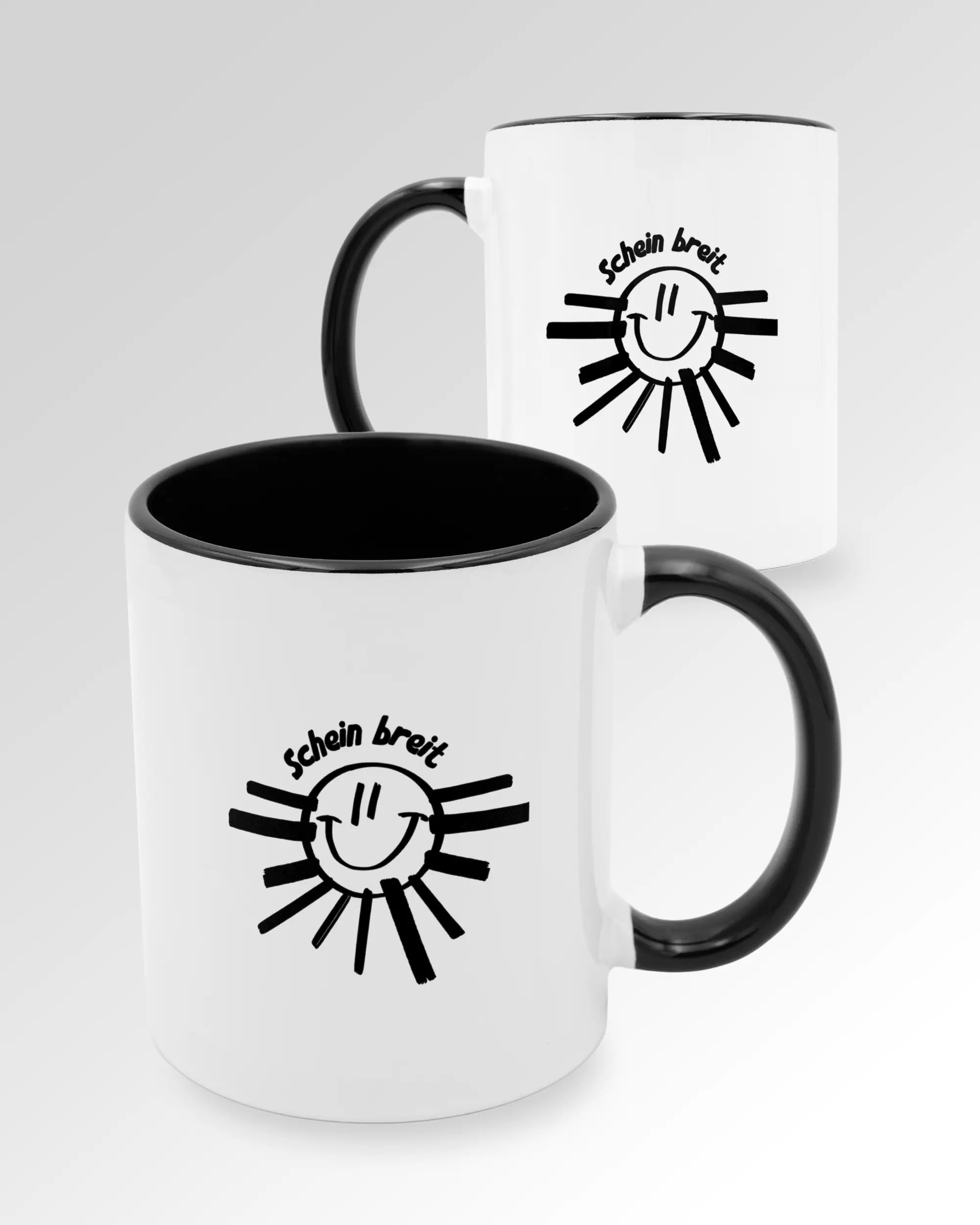 Variantenbild der beidseitig bedruckten Keramik Tasse von Maondo mit dem Design Schein Breit in der Farbe Schwarz-Weiß