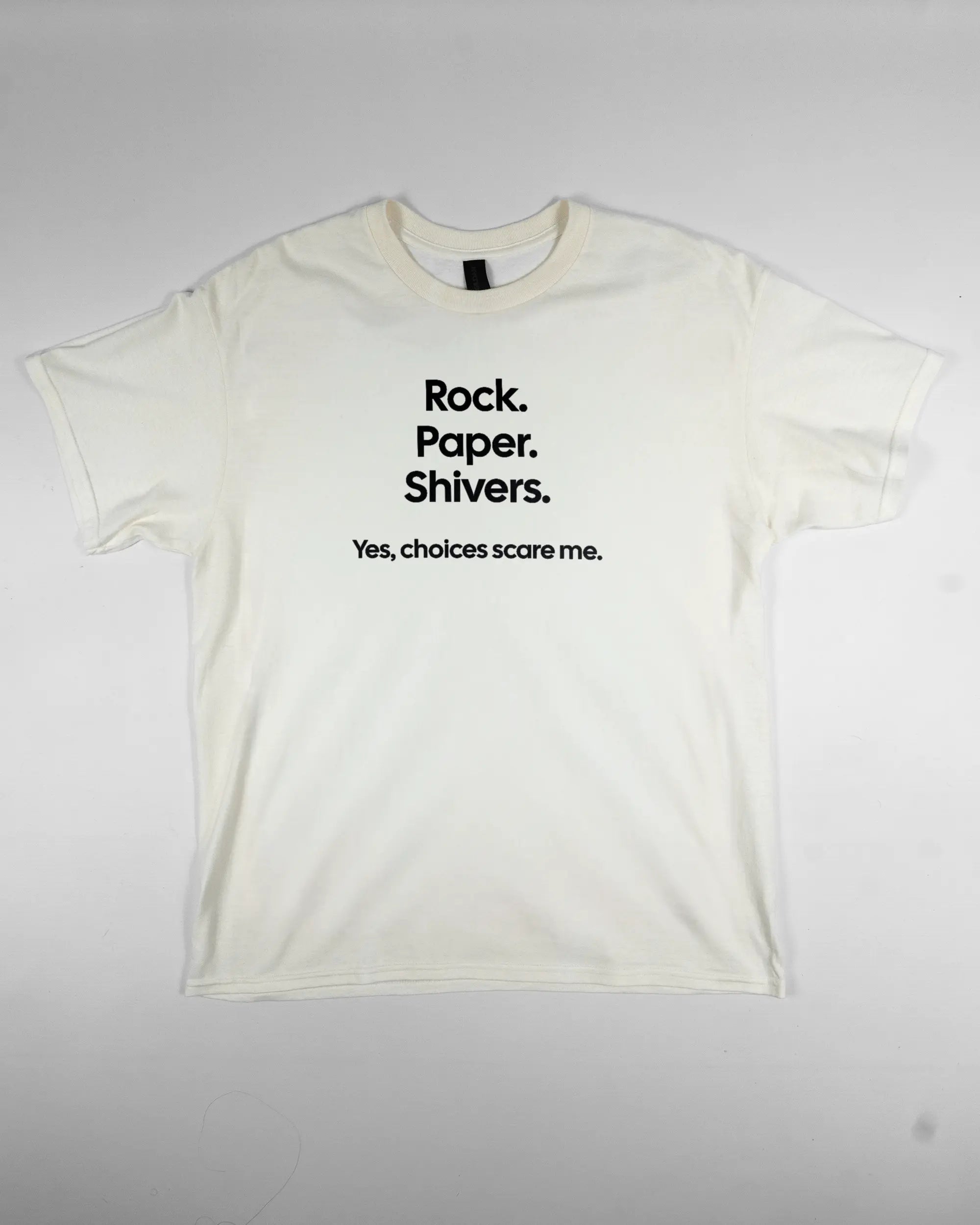 Vorderseite des Basic Unisex T-Shirt Regular von Maondo mit dem Design Rock Paper Shivers in der Farbe White und in der Größe L flach auf den Boden gelegt