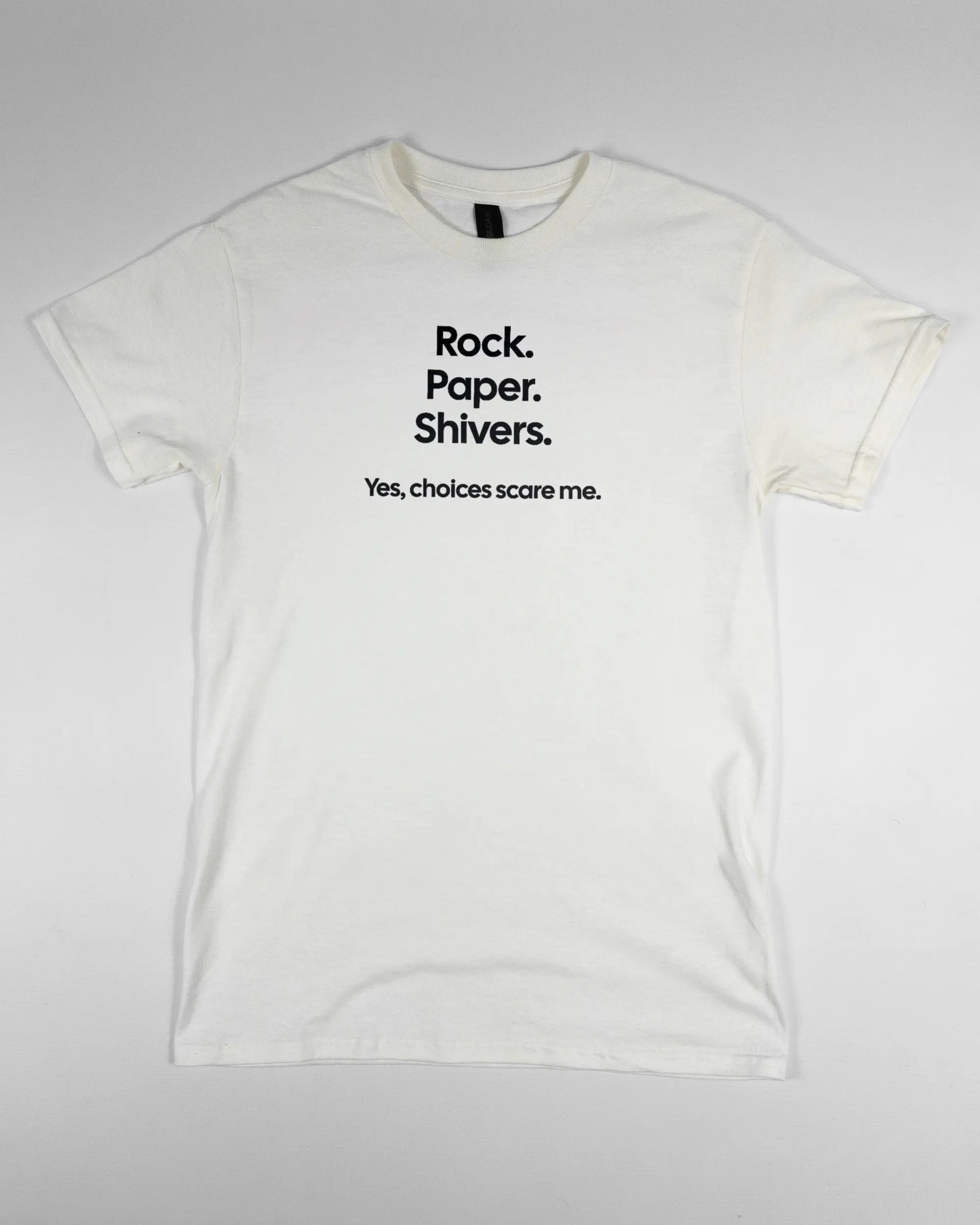 Vorderseite des Basic Unisex T-Shirt Regular von Maondo mit dem Design Rock Paper Shivers in der Farbe White und in der Größe S flach auf den Boden gelegt