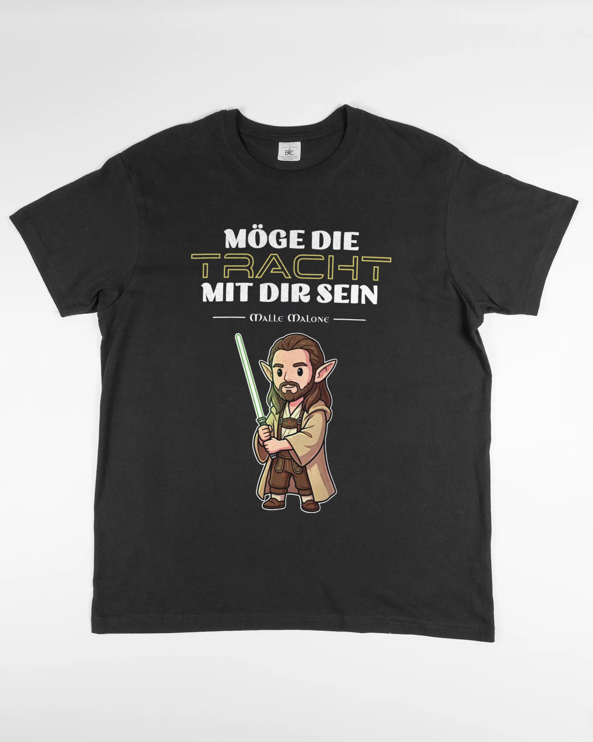 Vorderseite des Basic Unisex T-Shirt Soft von Maondo mit dem Design Tracht mit dir in der Farbe Black und in der Größe L flach auf den Boden gelegt