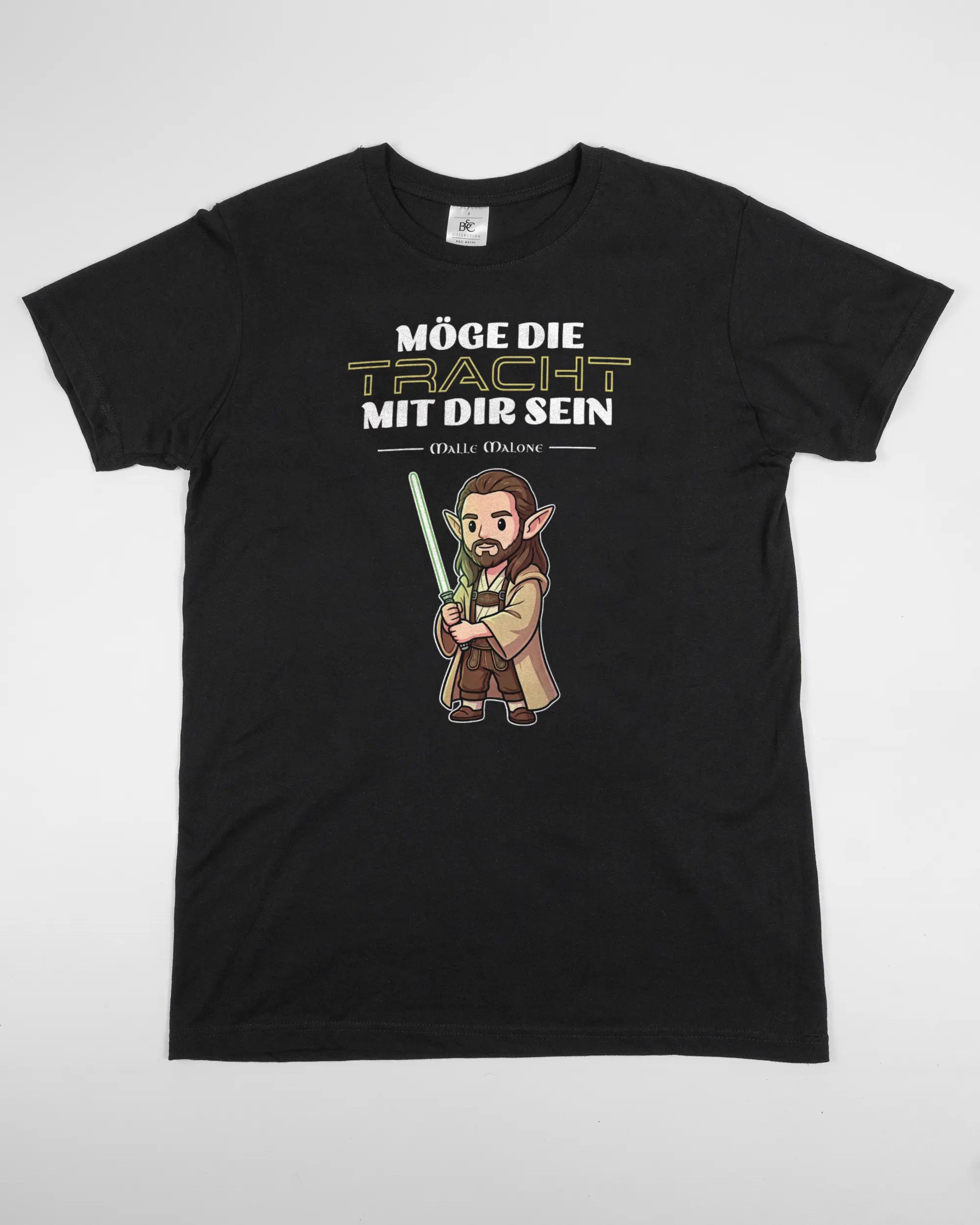 Vorderseite des Basic Unisex T-Shirt Soft von Maondo mit dem Design Tracht mit dir in der Farbe Black und in der Größe S flach auf den Boden gelegt