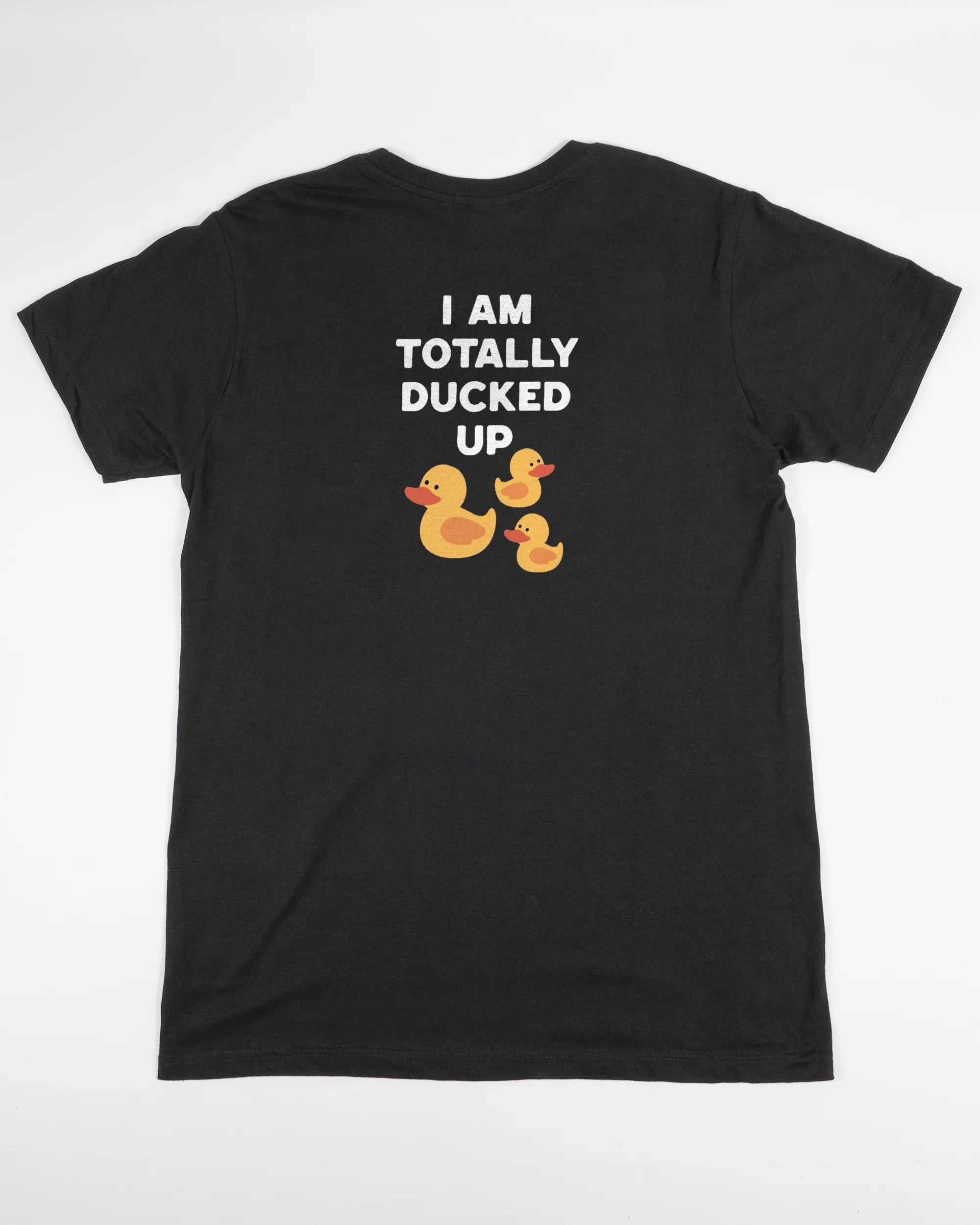 Rückseite des Basic Unisex T-Shirt Soft von Maondo mit dem Design Ducked Up in der Farbe Black und in der Größe S flach auf den Boden gelegt