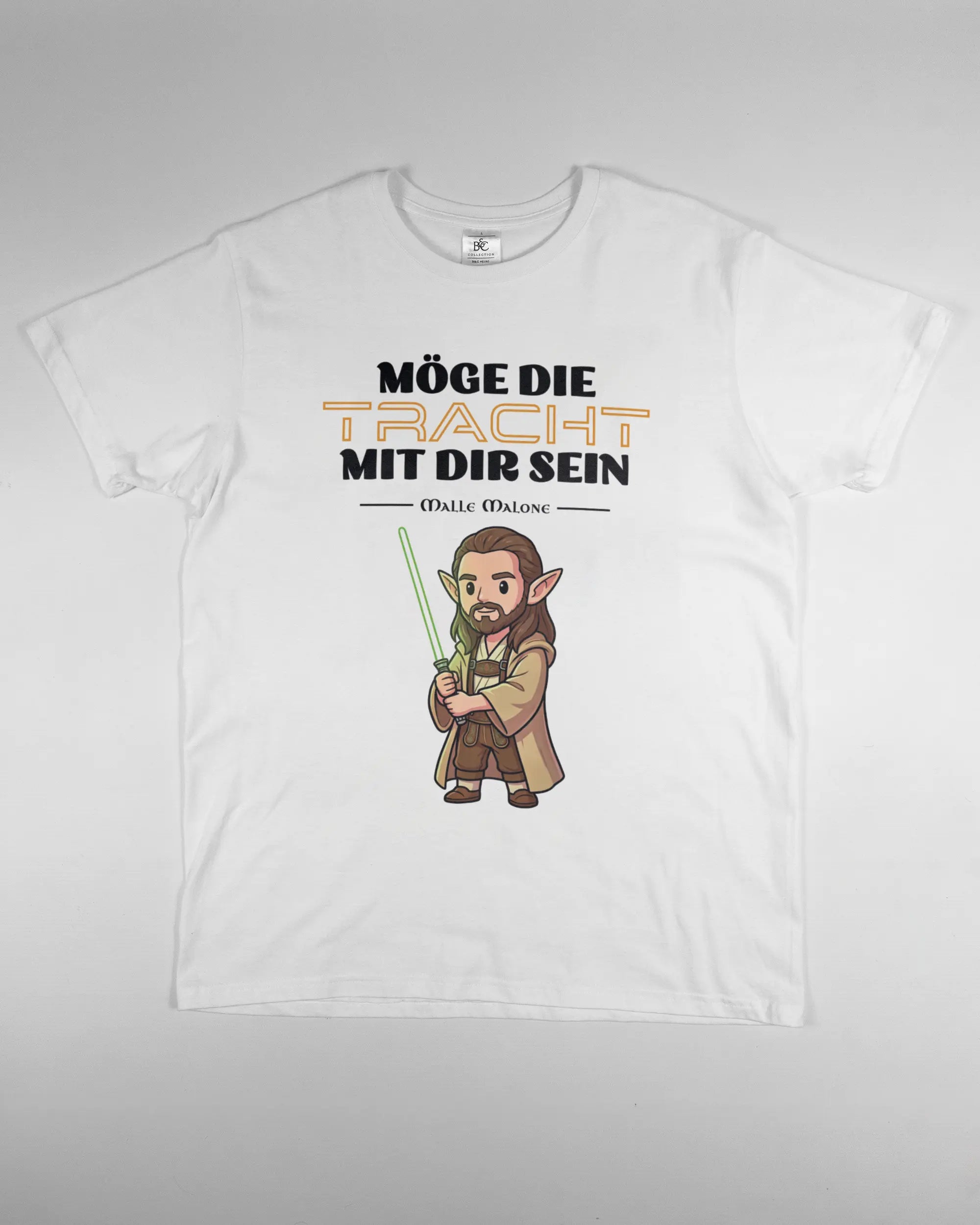 Vorderseite des Basic Unisex T-Shirt Soft von Maondo mit dem Design Tracht mit dir in der Farbe White und in der Größe L flach auf den Boden gelegt