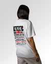 Weiblicher Modelshot der sekundären Druckseite des Organic Unisex T-Shirts von Maondo im Relaxed Fit mit dem Design Authentic Shit in der Farbe White