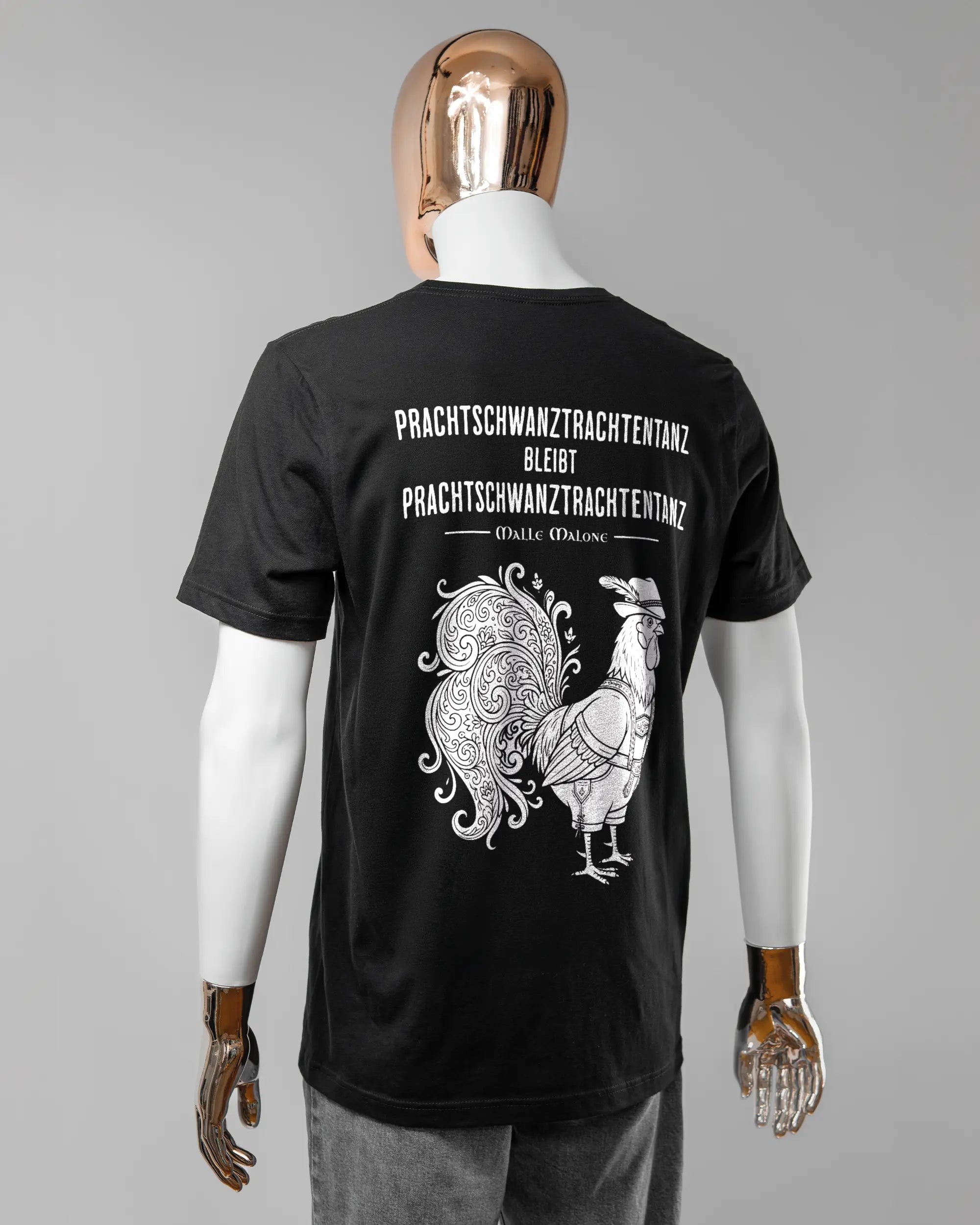 Rückseite des Basic Unisex T-Shirt Light von Maondo mit dem Design Trachtentanz in der Farbe Black und in der Größe L getragen von einer maskulinen Puppe