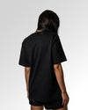 Sekundärer Modelshot der unbedruckten Seite des Organic Unisex T-Shirts von Maondo im Oversized Fit mit dem Design Blaumachen in der Farbe Black