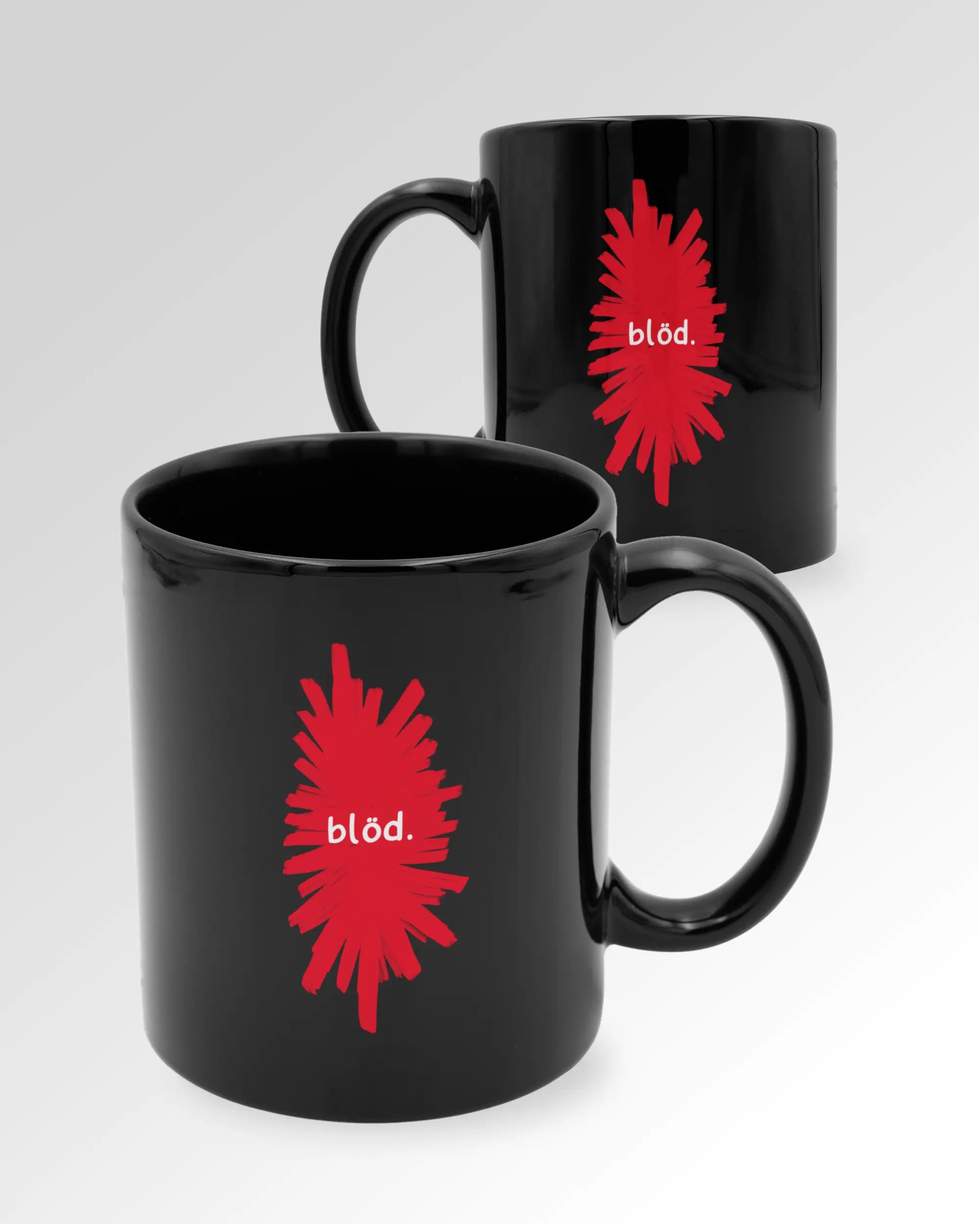 Variantenbild der beidseitig bedruckten Keramik Tasse von Maondo mit dem Design Blöd in der Farbe Schwarz