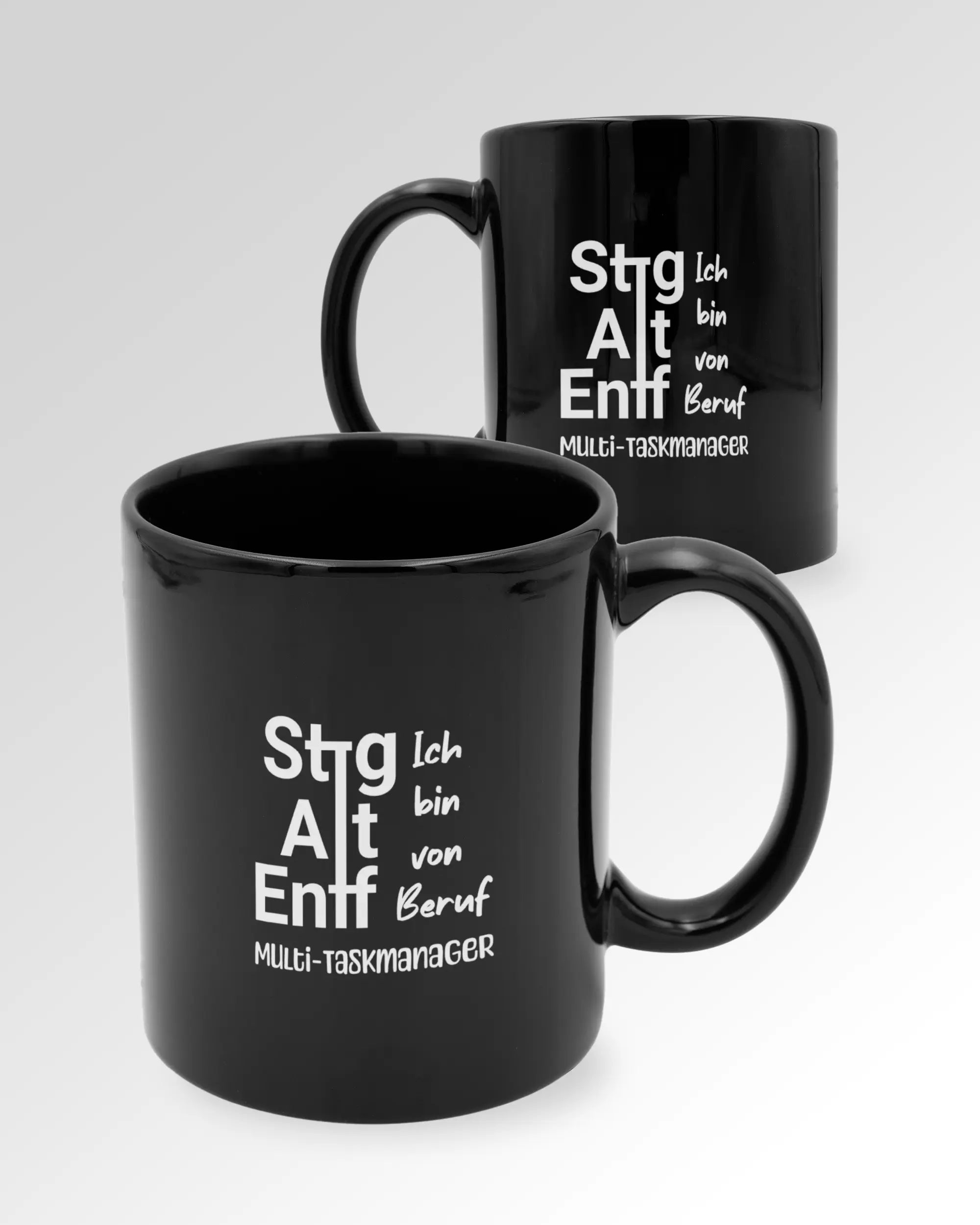 Variantenbild der beidseitig bedruckten Keramik Tasse von Maondo mit dem Design Multi-Taskmanager in der Farbe Schwarz