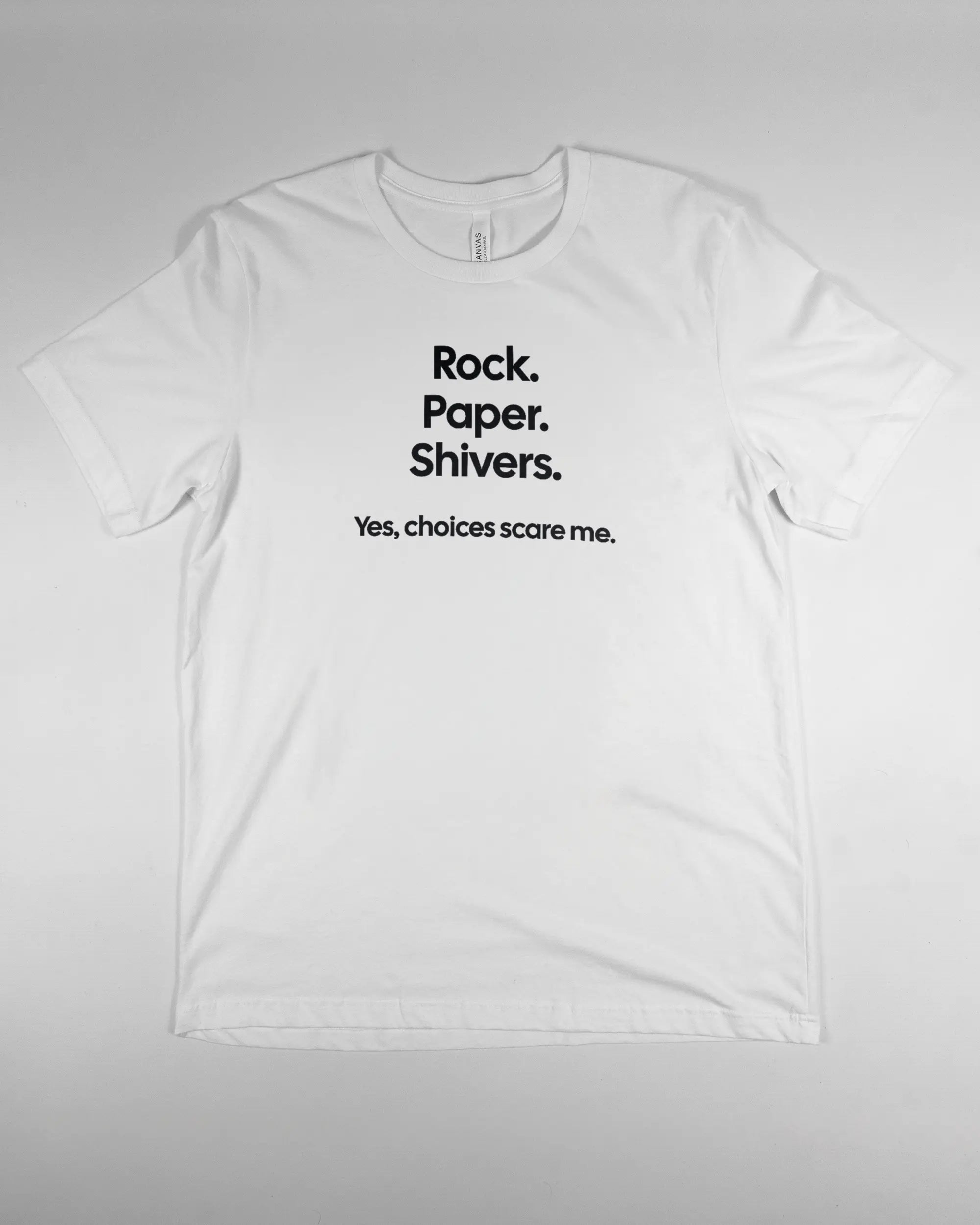 Vorderseite des Basic Unisex T-Shirt Light von Maondo mit dem Design Rock Paper Shivers in der Farbe White und in der Größe L flach auf den Boden gelegt