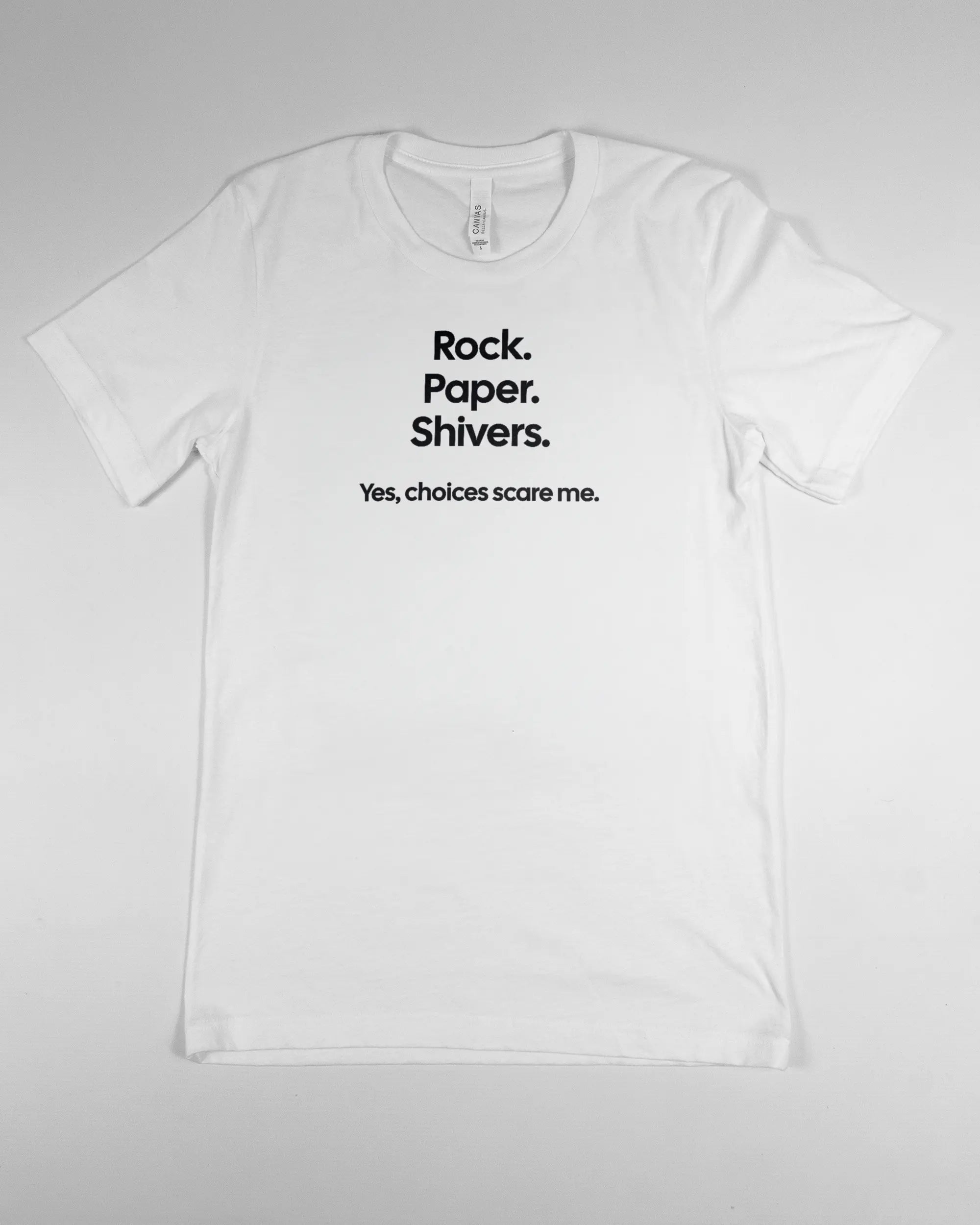 Vorderseite des Basic Unisex T-Shirt Light von Maondo mit dem Design Rock Paper Shivers in der Farbe White und in der Größe S flach auf den Boden gelegt