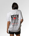 Weiblicher Modelshot der sekundären Druckseite des Organic Unisex T-Shirts von Maondo im Oversized Fit mit dem Design Authentic Shit in der Farbe White