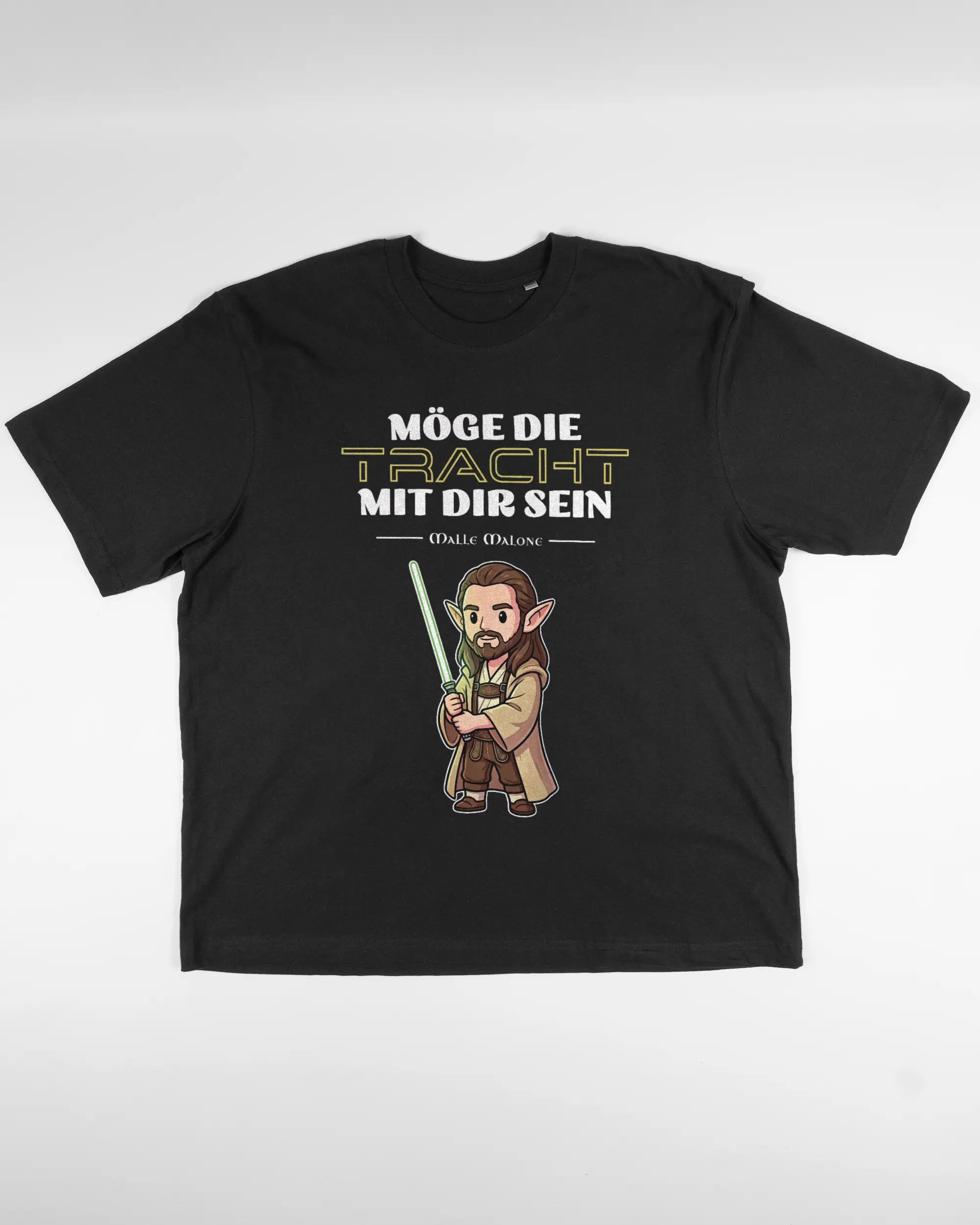 Vorderseite des Basic Unisex T-Shirt Oversized von Maondo mit dem Design Tracht mit dir in der Farbe Black und in der Größe L flach auf den Boden gelegt