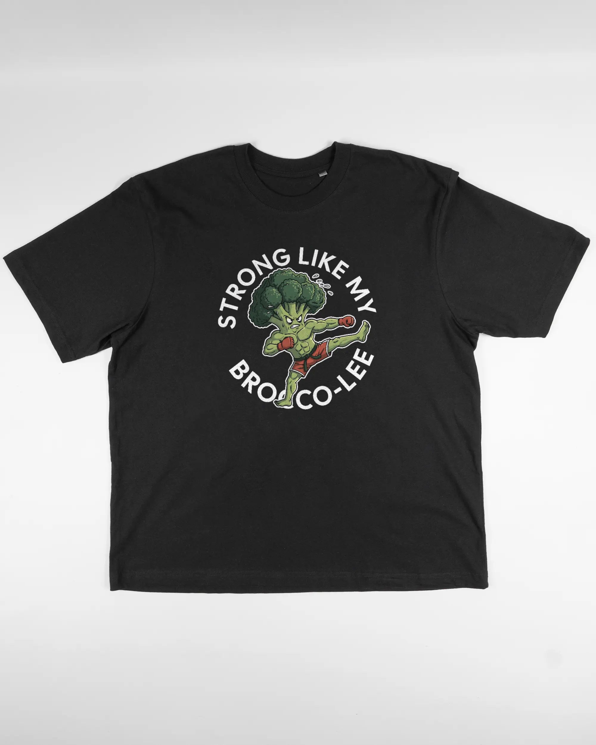 Vorderseite des Basic Unisex T-Shirt Oversized von Maondo mit dem Design Brocco-Lee in der Farbe Black und in der Größe L flach auf den Boden gelegt