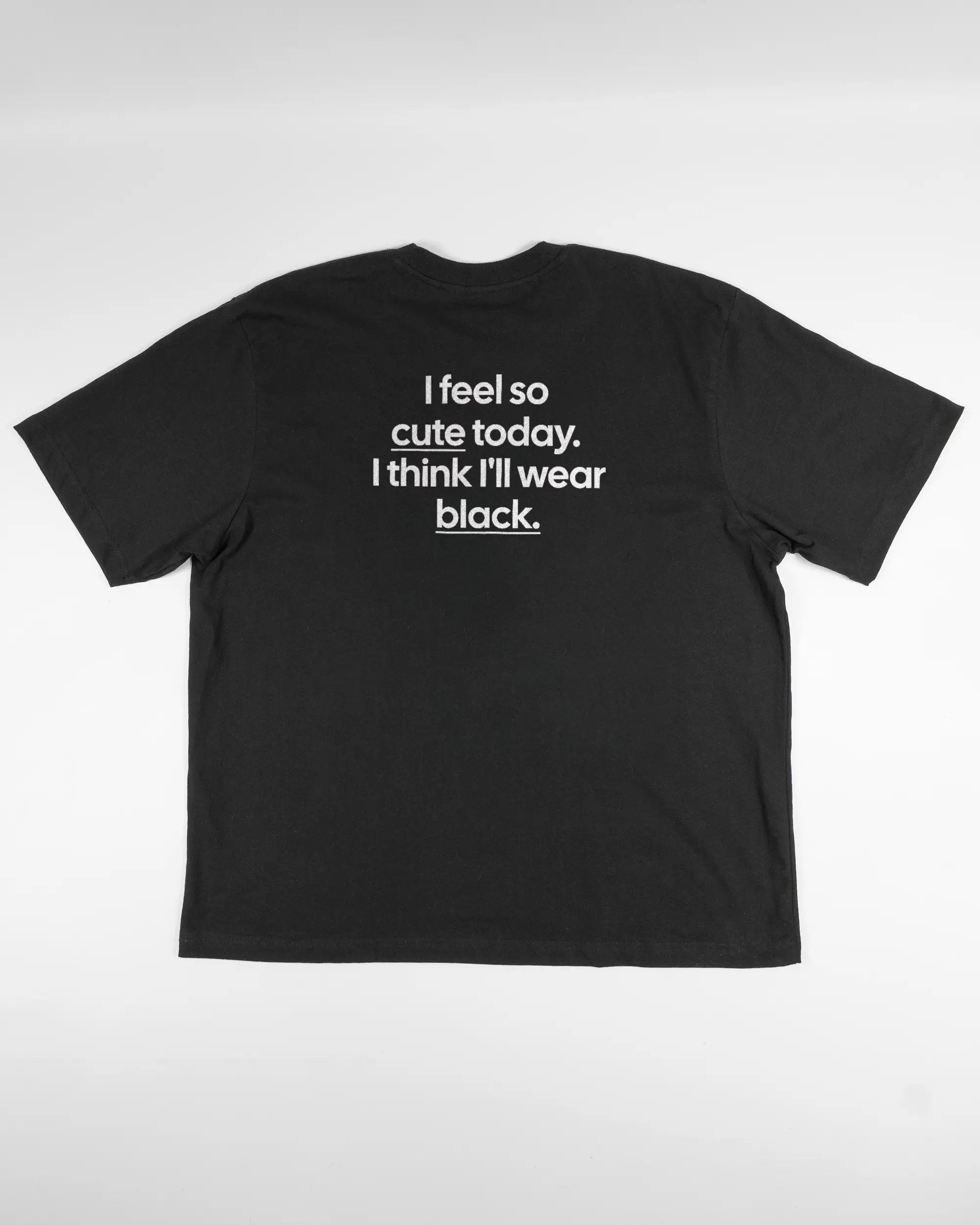 Rückseite des Basic Unisex T-Shirt Oversized von Maondo mit dem Design Colorful Day in der Farbe Black und in der Größe L flach auf den Boden gelegt