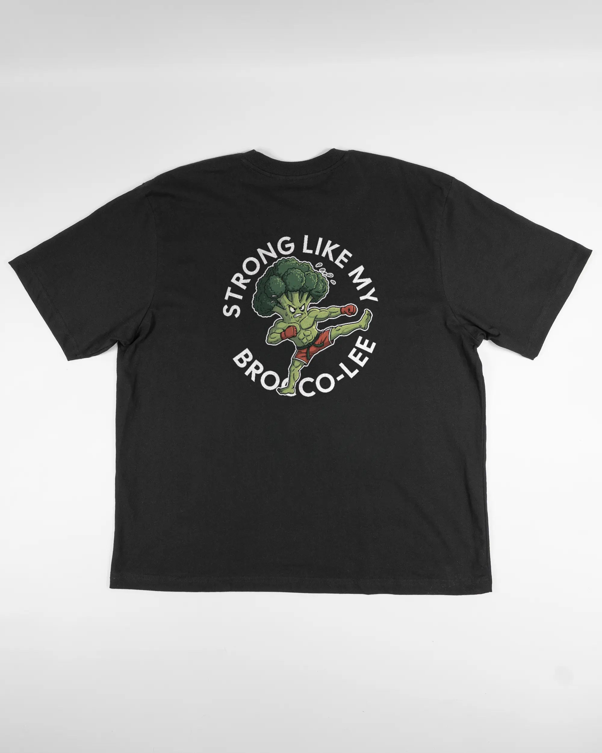 Rückseite des Basic Unisex T-Shirt Oversized von Maondo mit dem Design Brocco-Lee in der Farbe Black und in der Größe L flach auf den Boden gelegt