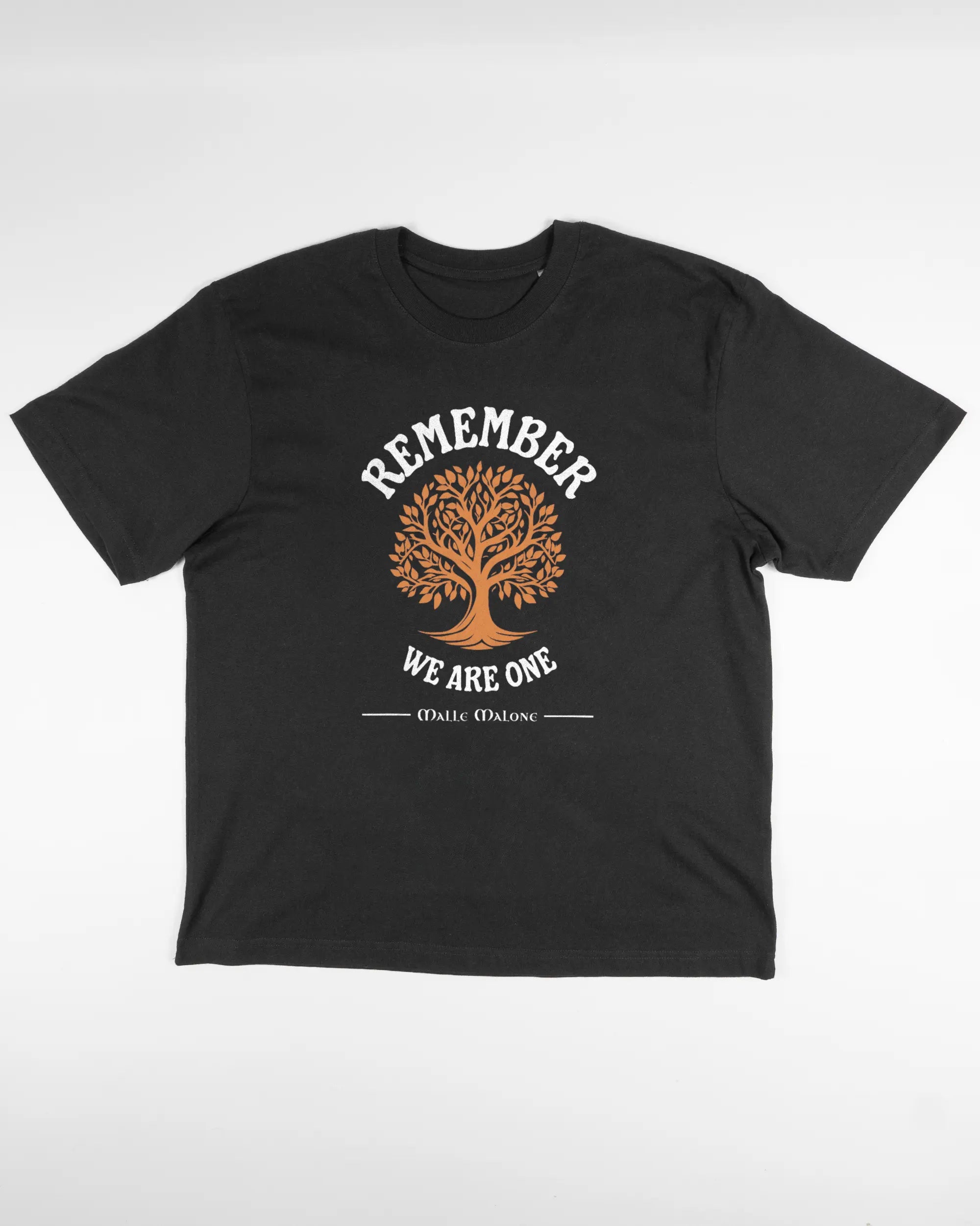 Vorderseite des Basic Unisex T-Shirt Oversized von Maondo mit dem Design We are one in der Farbe Black und in der Größe S flach auf den Boden gelegt