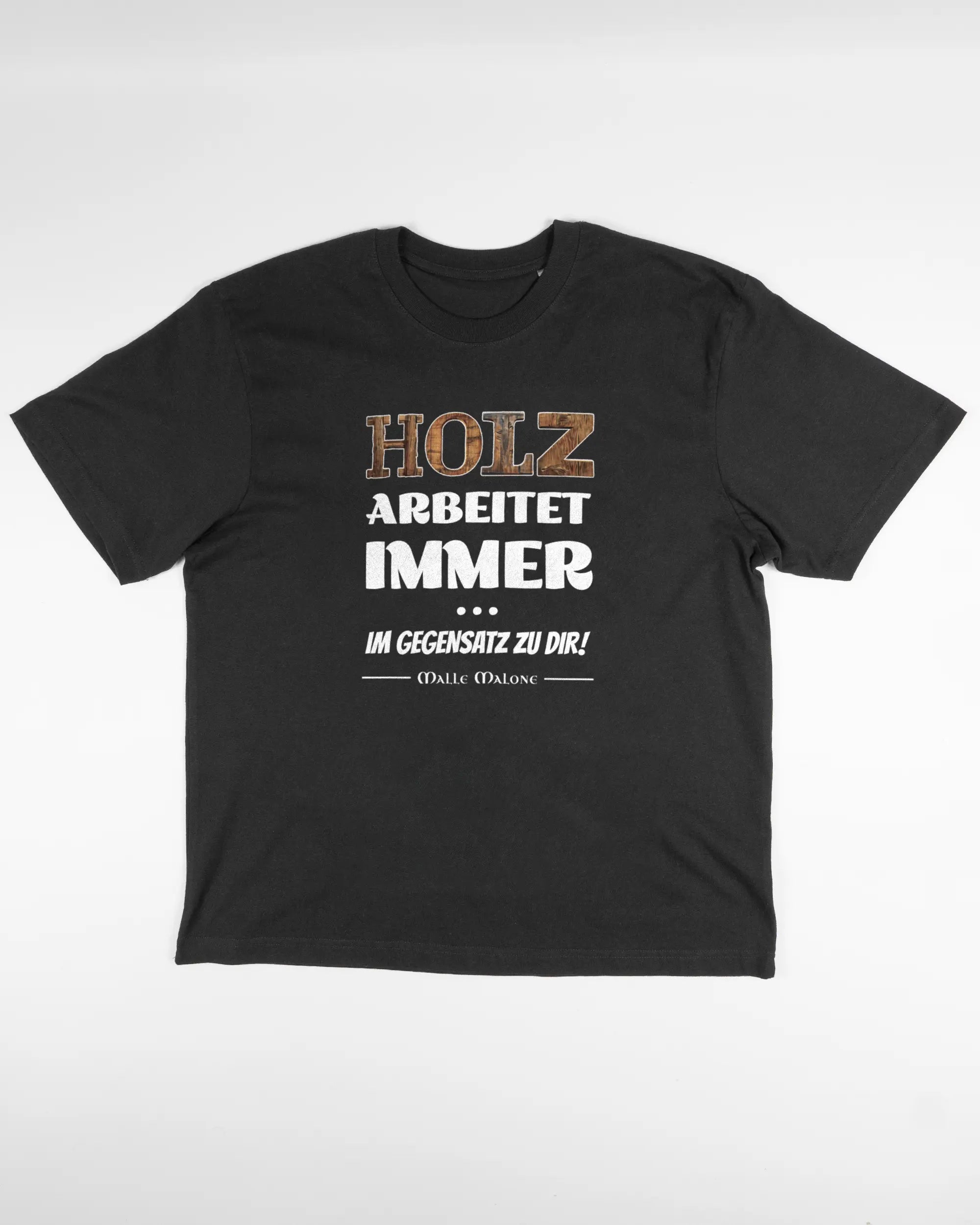 Vorderseite des Basic Unisex T-Shirt Oversized von Maondo mit dem Design Holzarbeit in der Farbe Black und in der Größe S flach auf den Boden gelegt