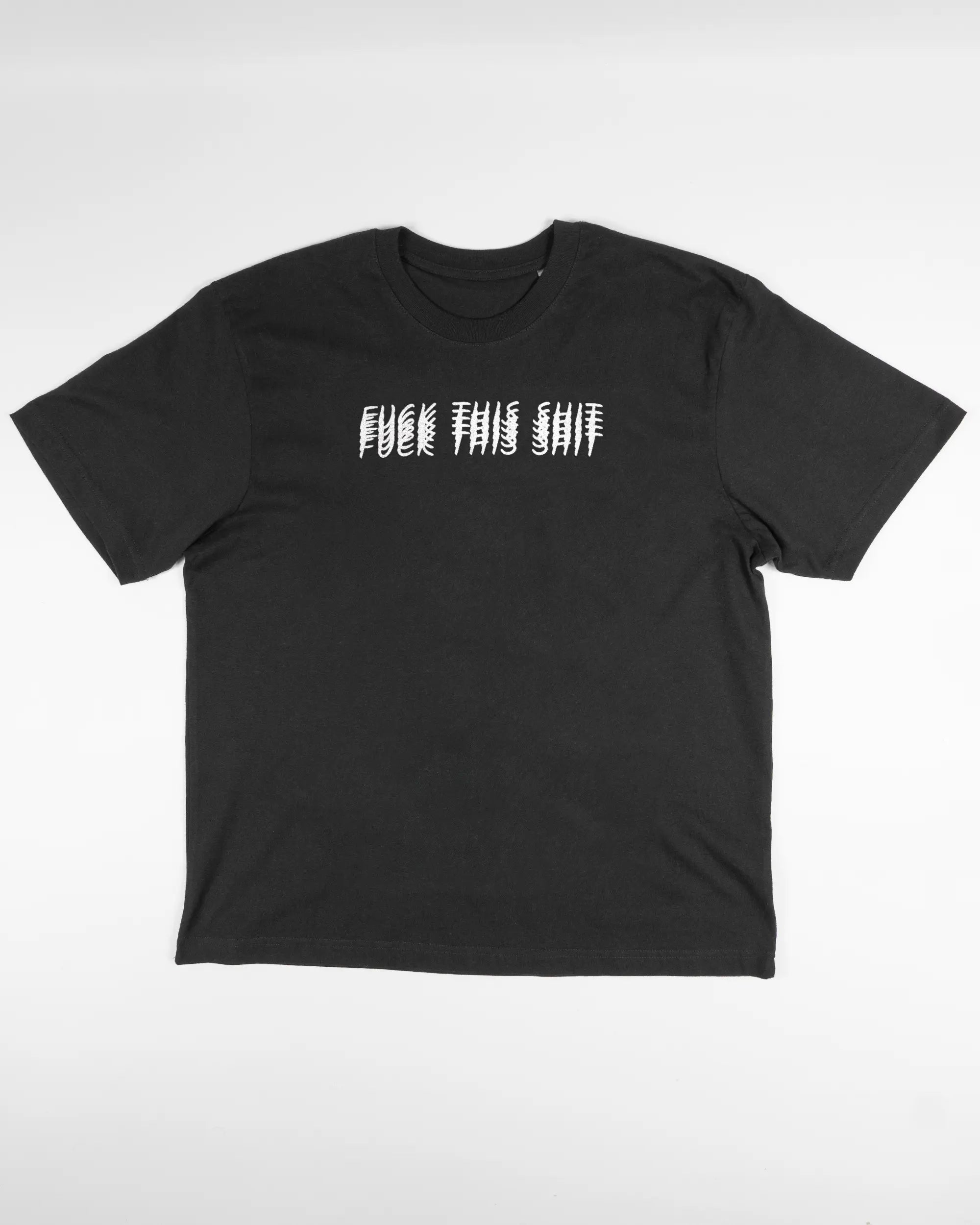 Vorderseite des Basic Unisex T-Shirt Oversized von Maondo mit dem Design Hidden Message in der Farbe Black und in der Größe S flach auf den Boden gelegt