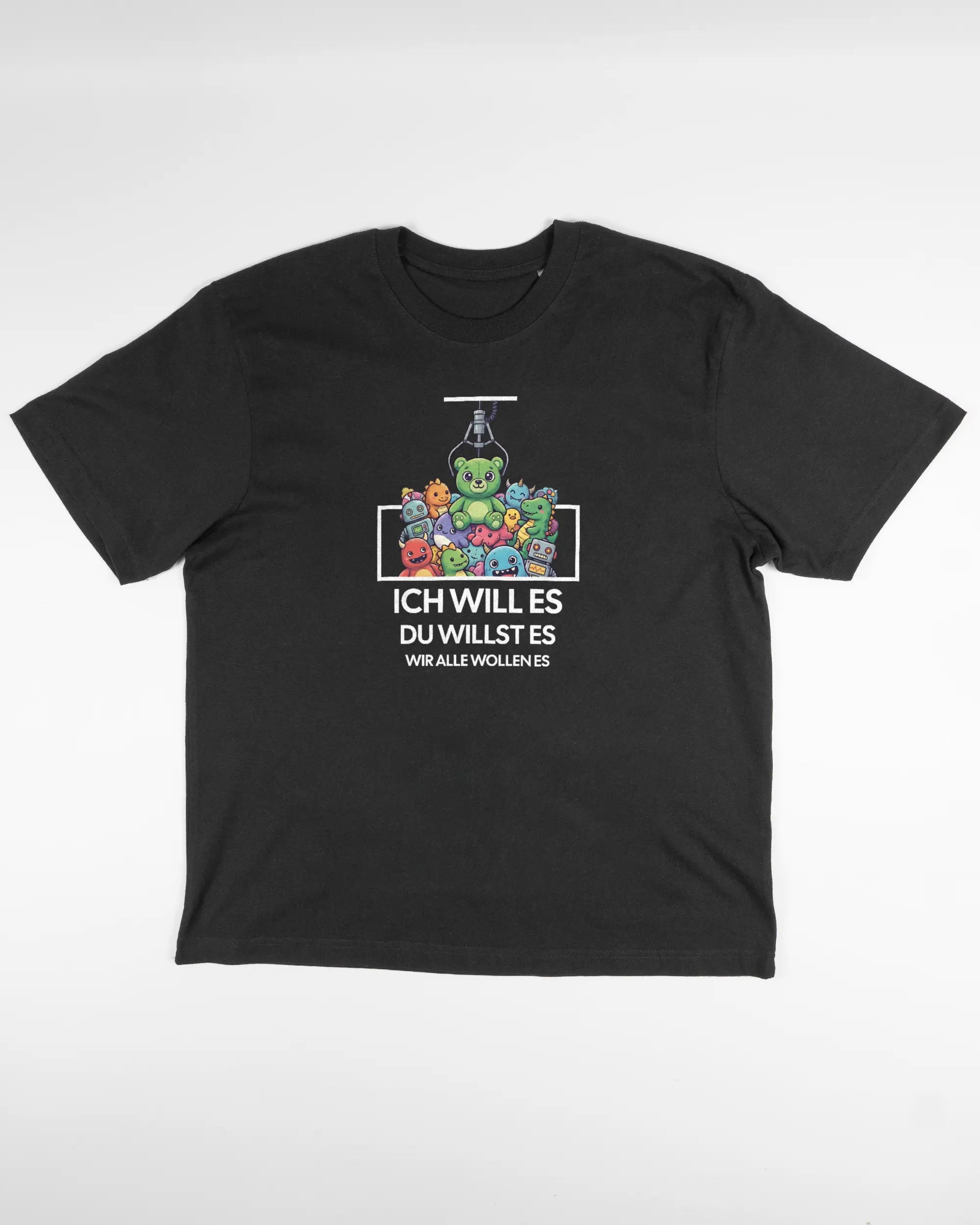 Vorderseite des Basic Unisex T-Shirt Oversized von Maondo mit dem Design Will Stofftier in der Farbe Black und in der Größe S flach auf den Boden gelegt