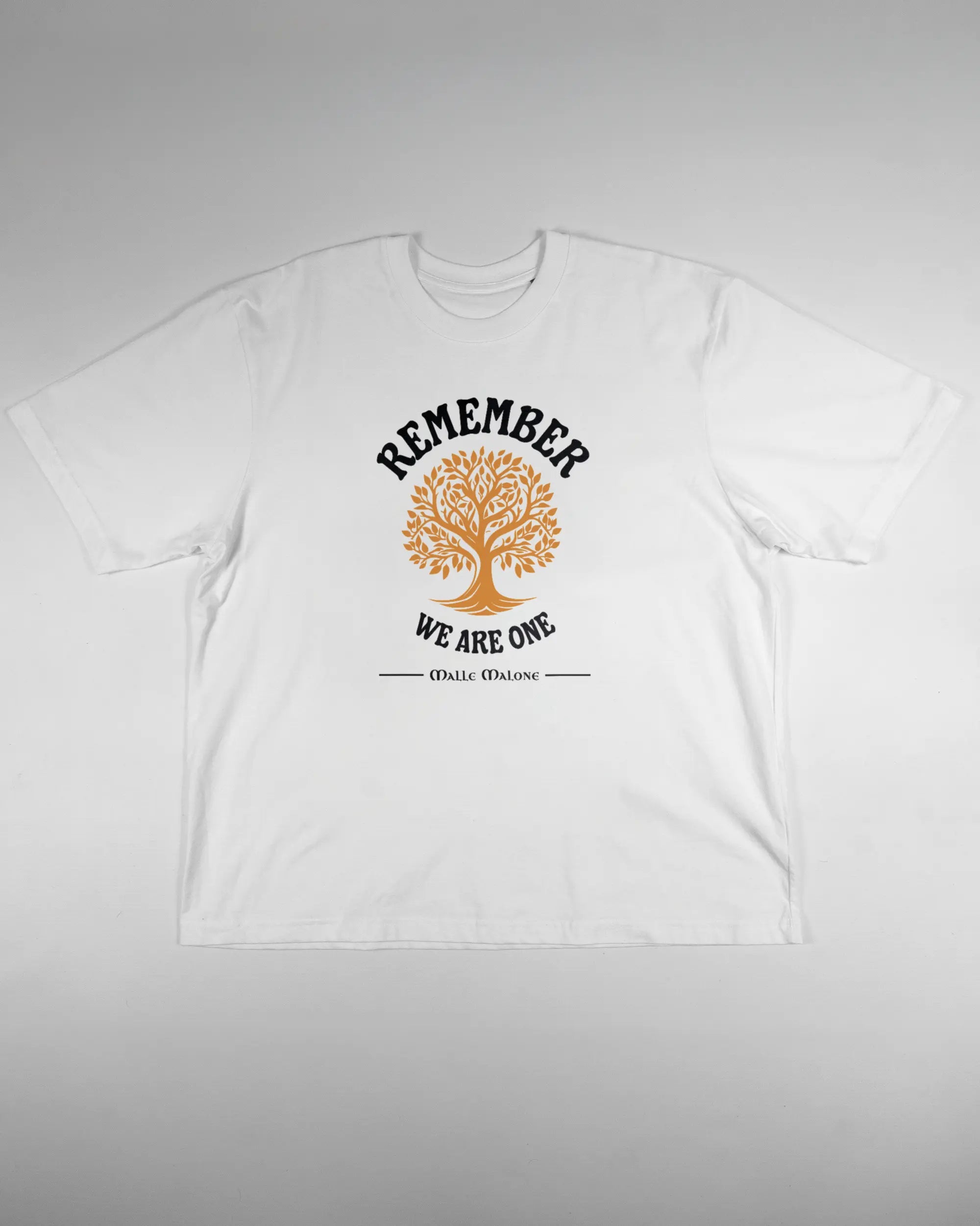 Vorderseite des Basic Unisex T-Shirt Oversized von Maondo mit dem Design We are one in der Farbe White und in der Größe L flach auf den Boden gelegt