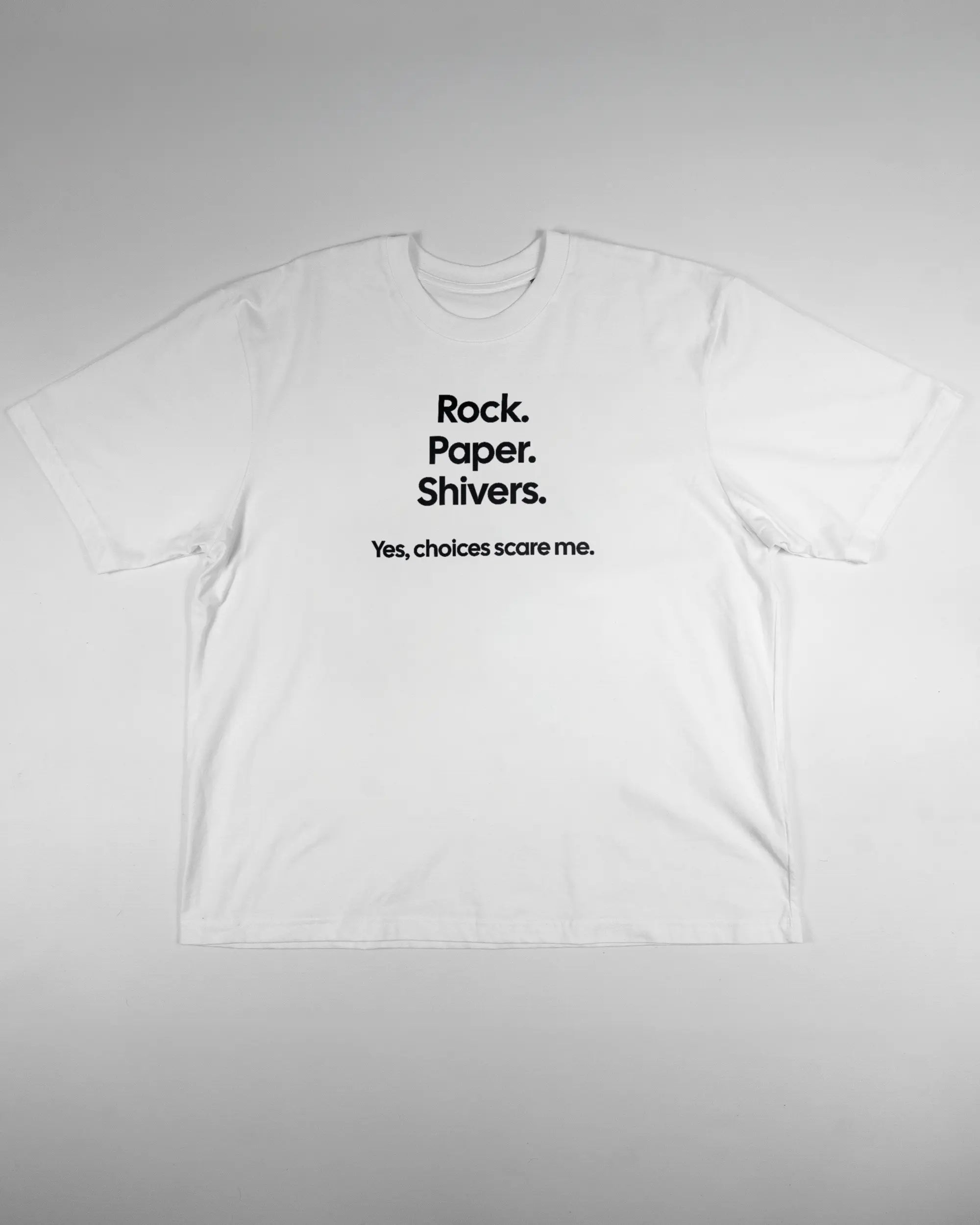 Vorderseite des Basic Unisex T-Shirt Oversized von Maondo mit dem Design Rock Paper Shivers in der Farbe White und in der Größe L flach auf den Boden gelegt