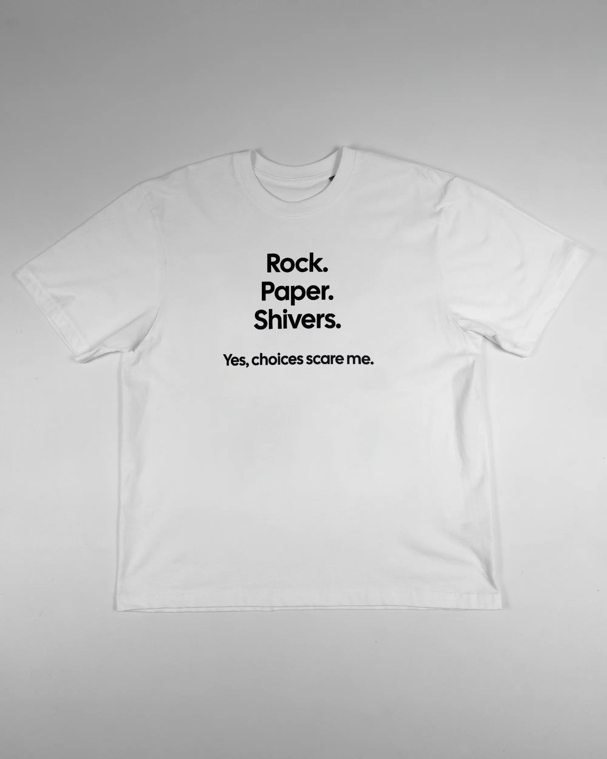 Vorderseite des Basic Unisex T-Shirt Oversized von Maondo mit dem Design Rock Paper Shivers in der Farbe White und in der Größe S flach auf den Boden gelegt