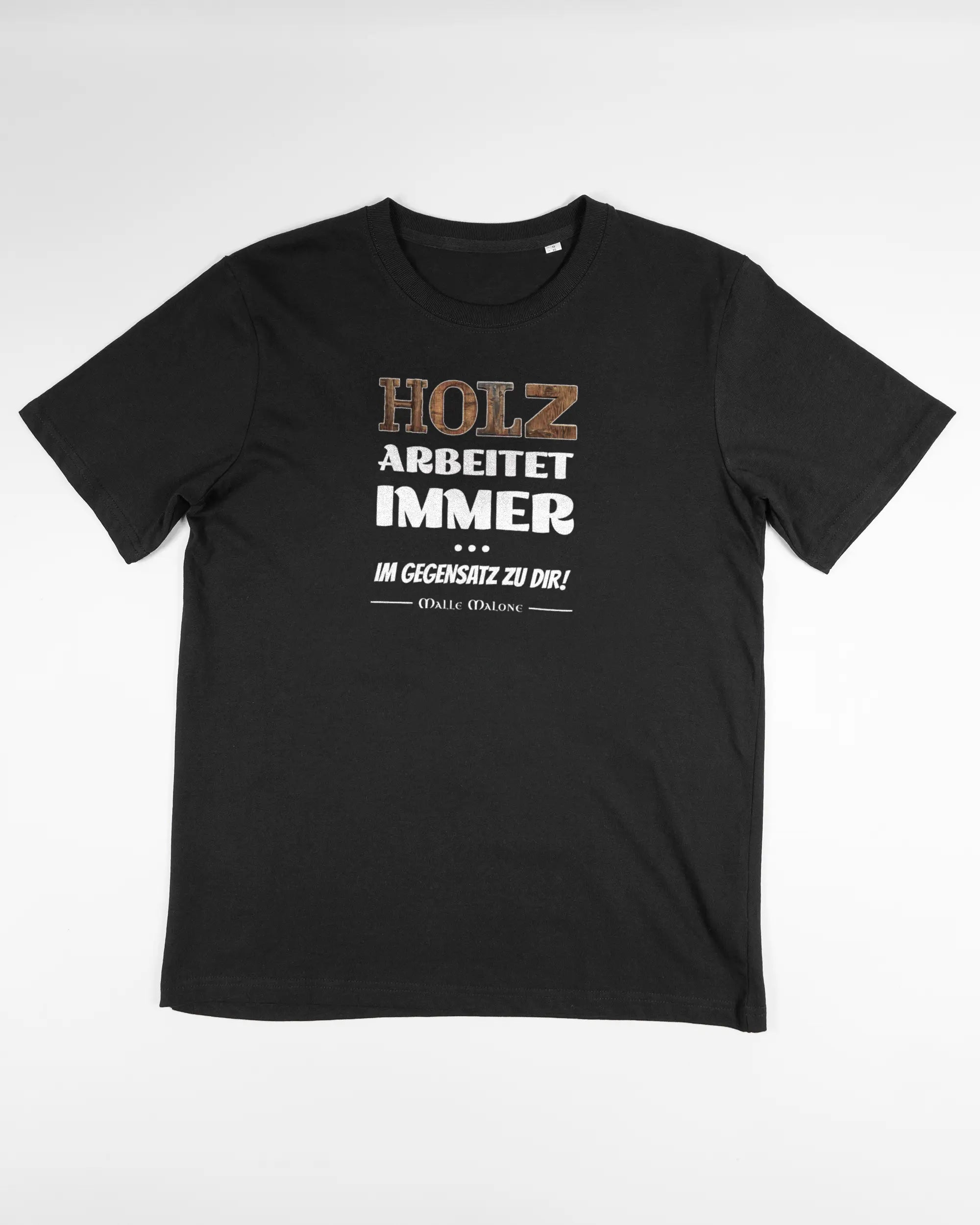 Vorderseite des Organic Unisex T-Shirt Relaxed von Maondo mit dem Design Holzarbeit in der Farbe Black und in der Größe S flach auf den Boden gelegt