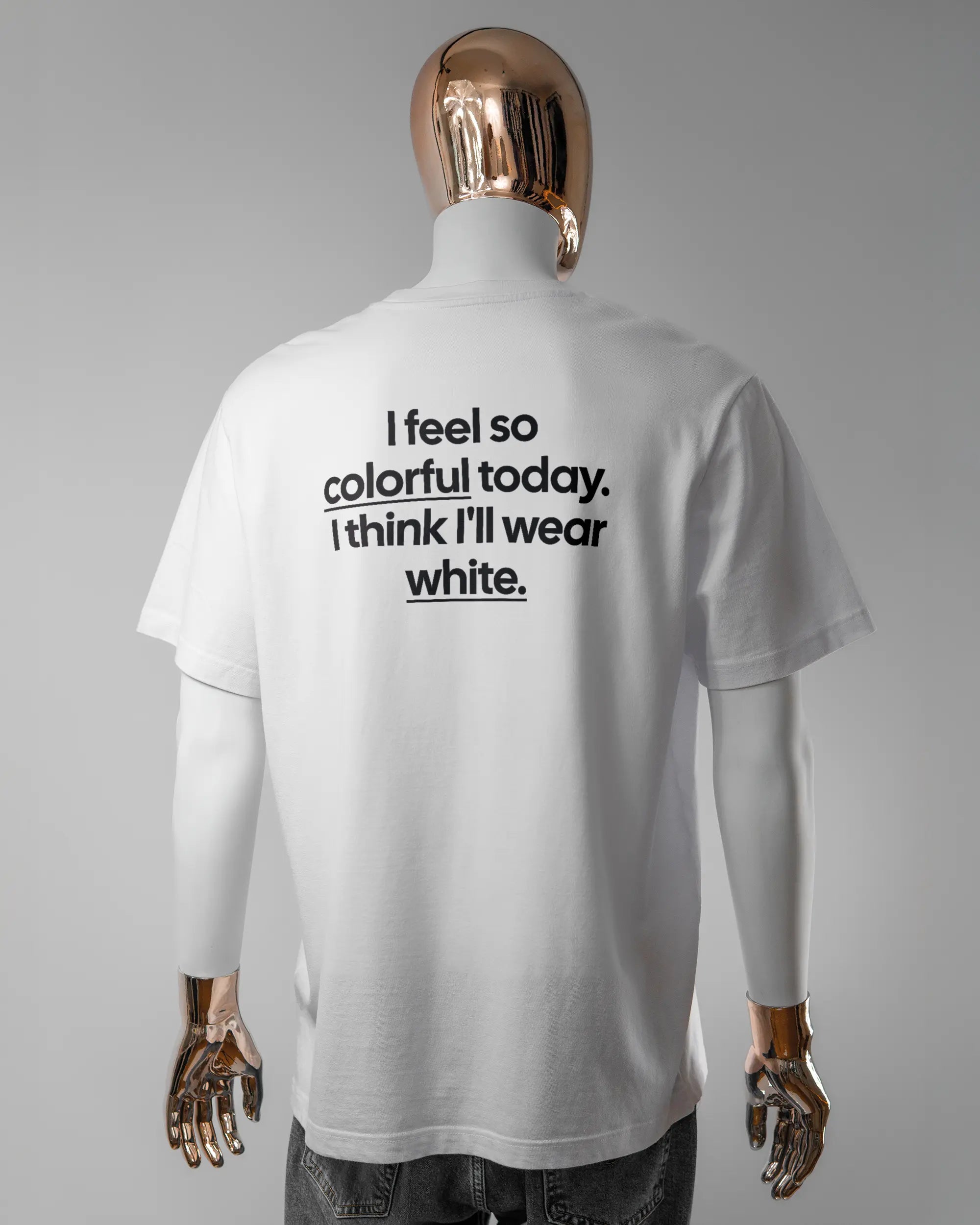 Rückseite des Organic Unisex T-Shirt Relaxed von Maondo mit dem Design Colorful Day in der Farbe White und in der Größe L getragen von einer maskulinen Puppe