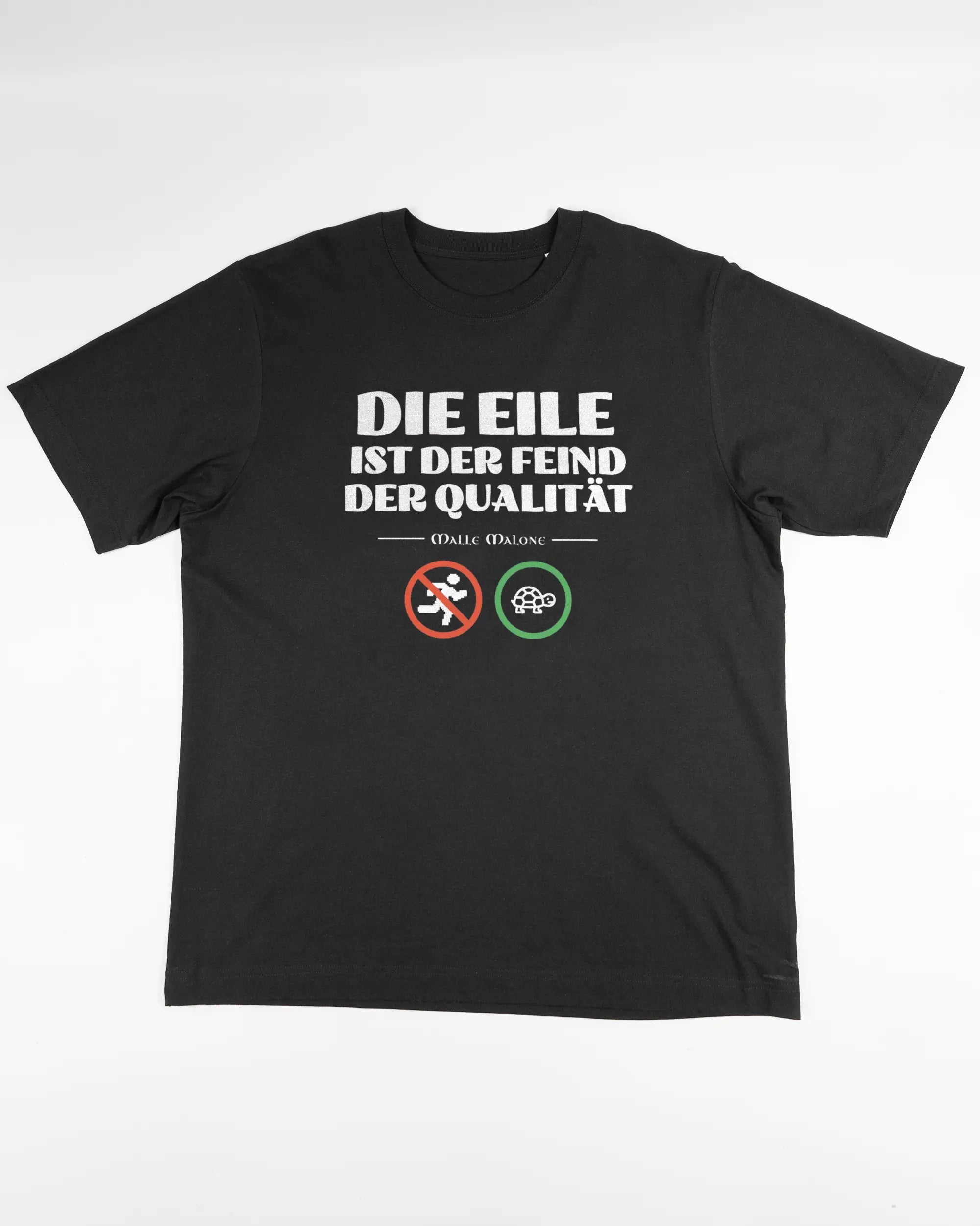 Vorderseite des Organic Unisex T-Shirt Heavy Oversized von Maondo mit dem Design Keine Eile in der Farbe Black und in der Größe L flach auf den Boden gelegt