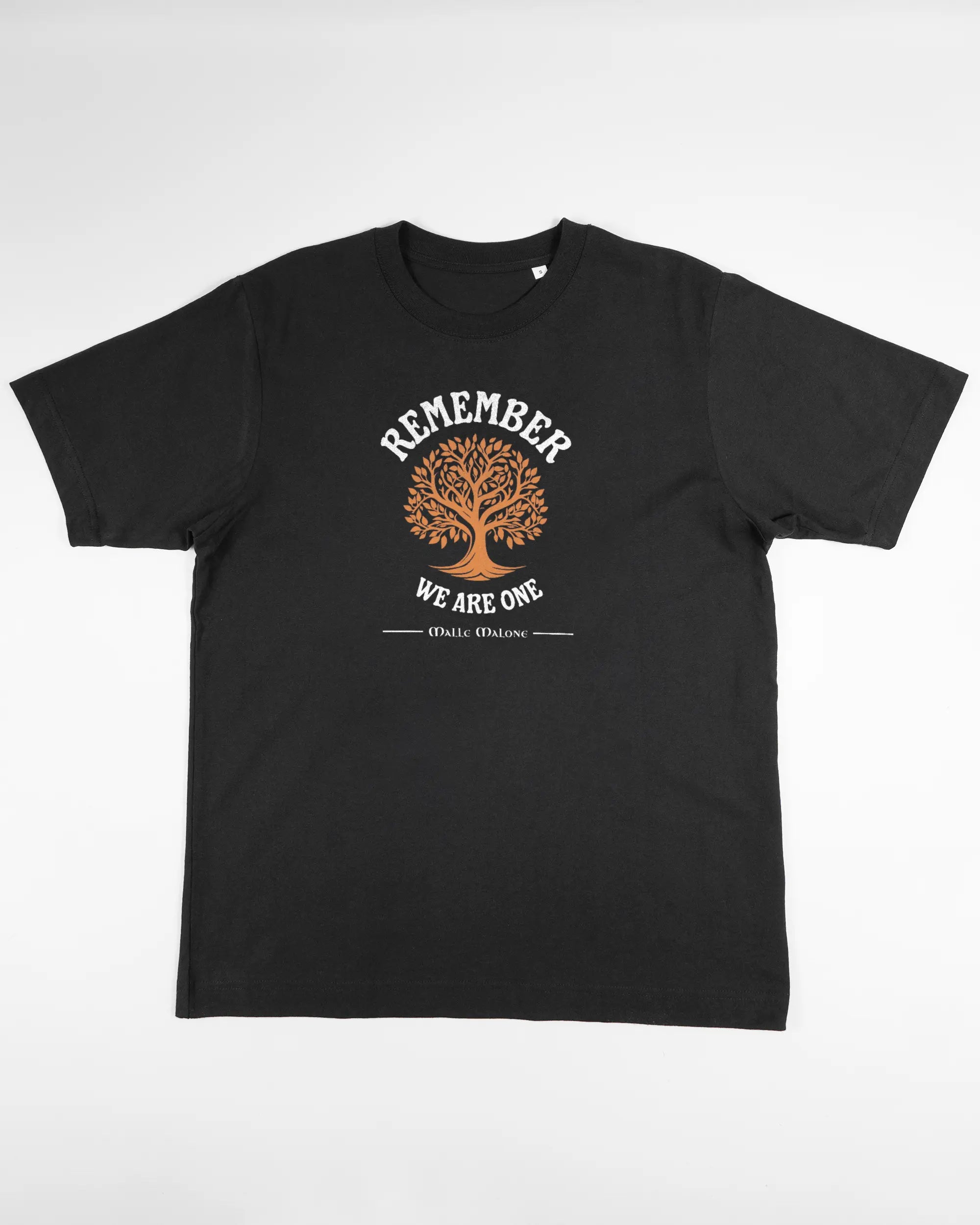 Vorderseite des Organic Unisex T-Shirt Heavy Oversized von Maondo mit dem Design We are one in der Farbe Black und in der Größe S flach auf den Boden gelegt