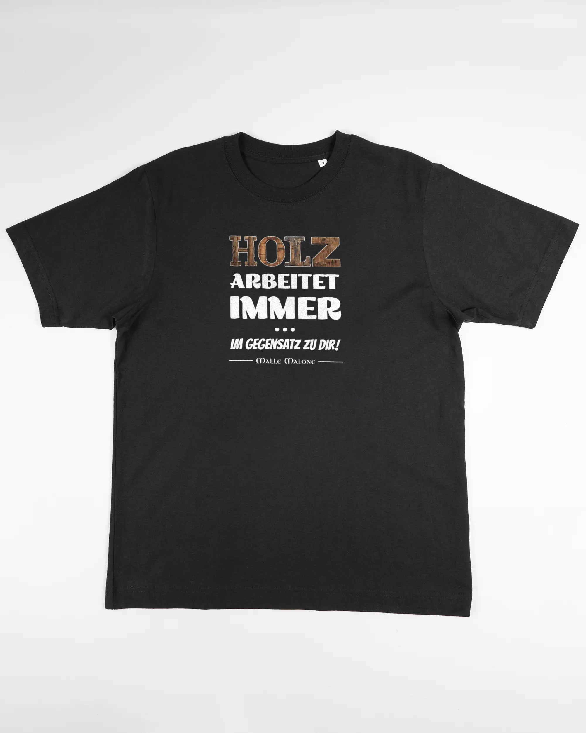 Vorderseite des Organic Unisex T-Shirt Heavy Oversized von Maondo mit dem Design Holzarbeit in der Farbe Black und in der Größe S flach auf den Boden gelegt