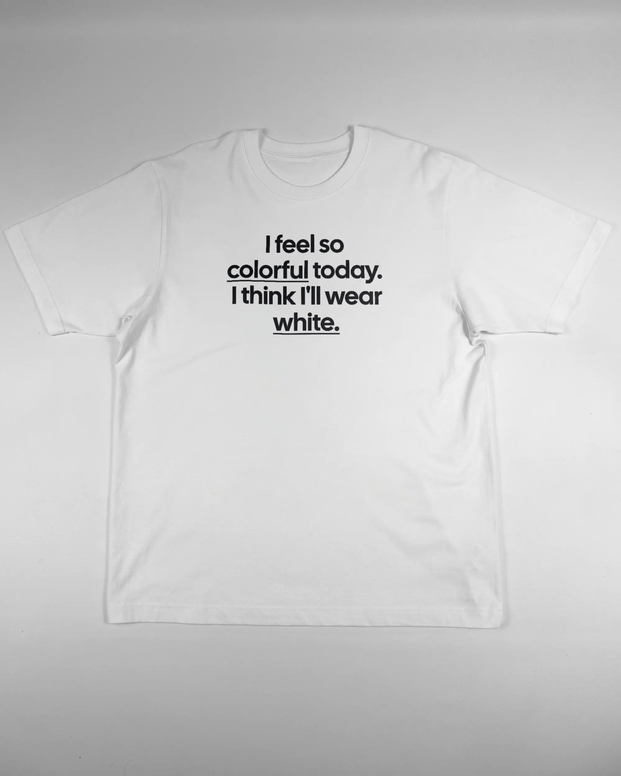 Vorderseite des Organic Unisex T-Shirt Heavy Oversized von Maondo mit dem Design Colorful Day in der Farbe White und in der Größe L flach auf den Boden gelegt