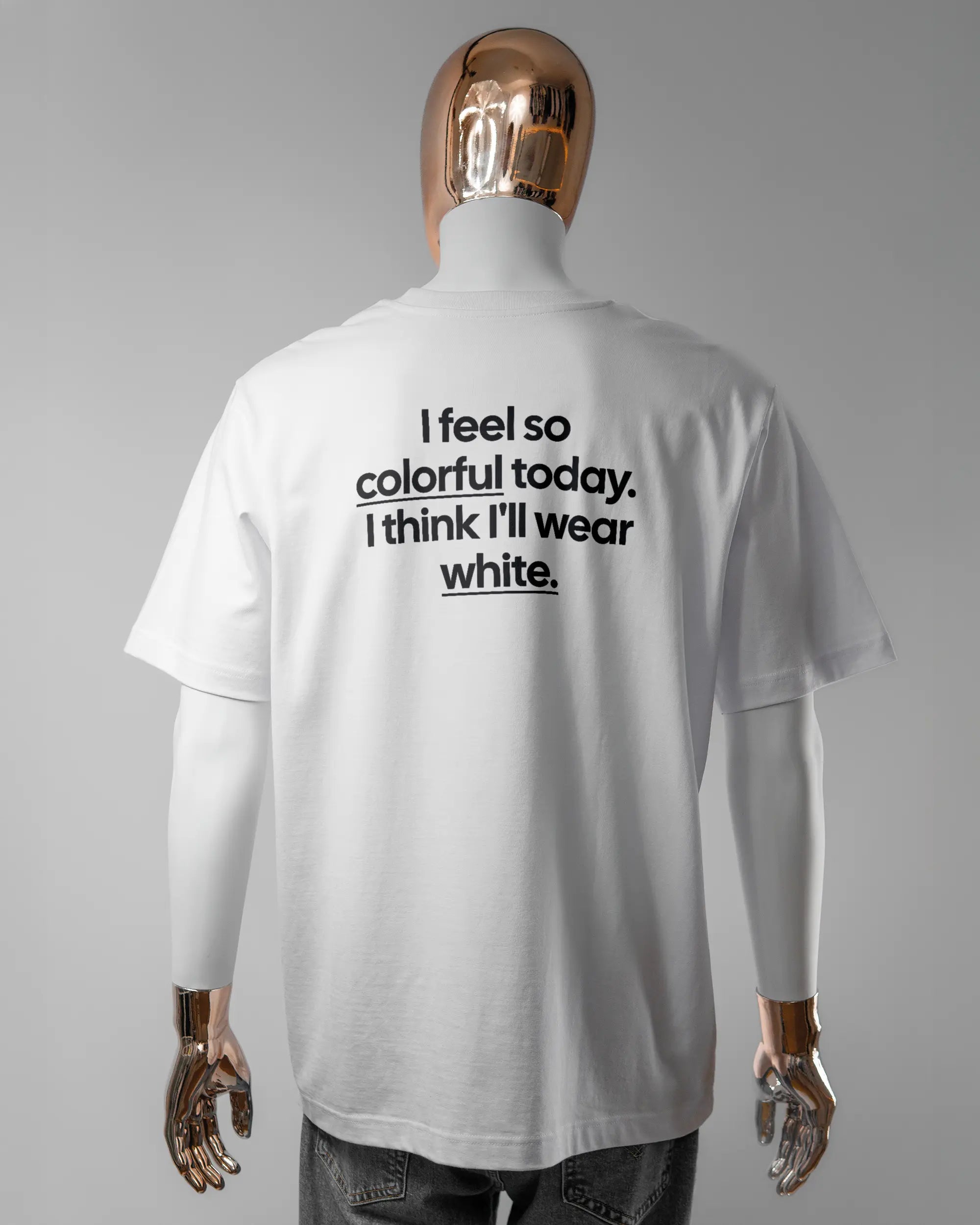 Rückseite des Organic Unisex T-Shirt Heavy Oversized von Maondo mit dem Design Colorful Day in der Farbe White und in der Größe L getragen von einer maskulinen Puppe