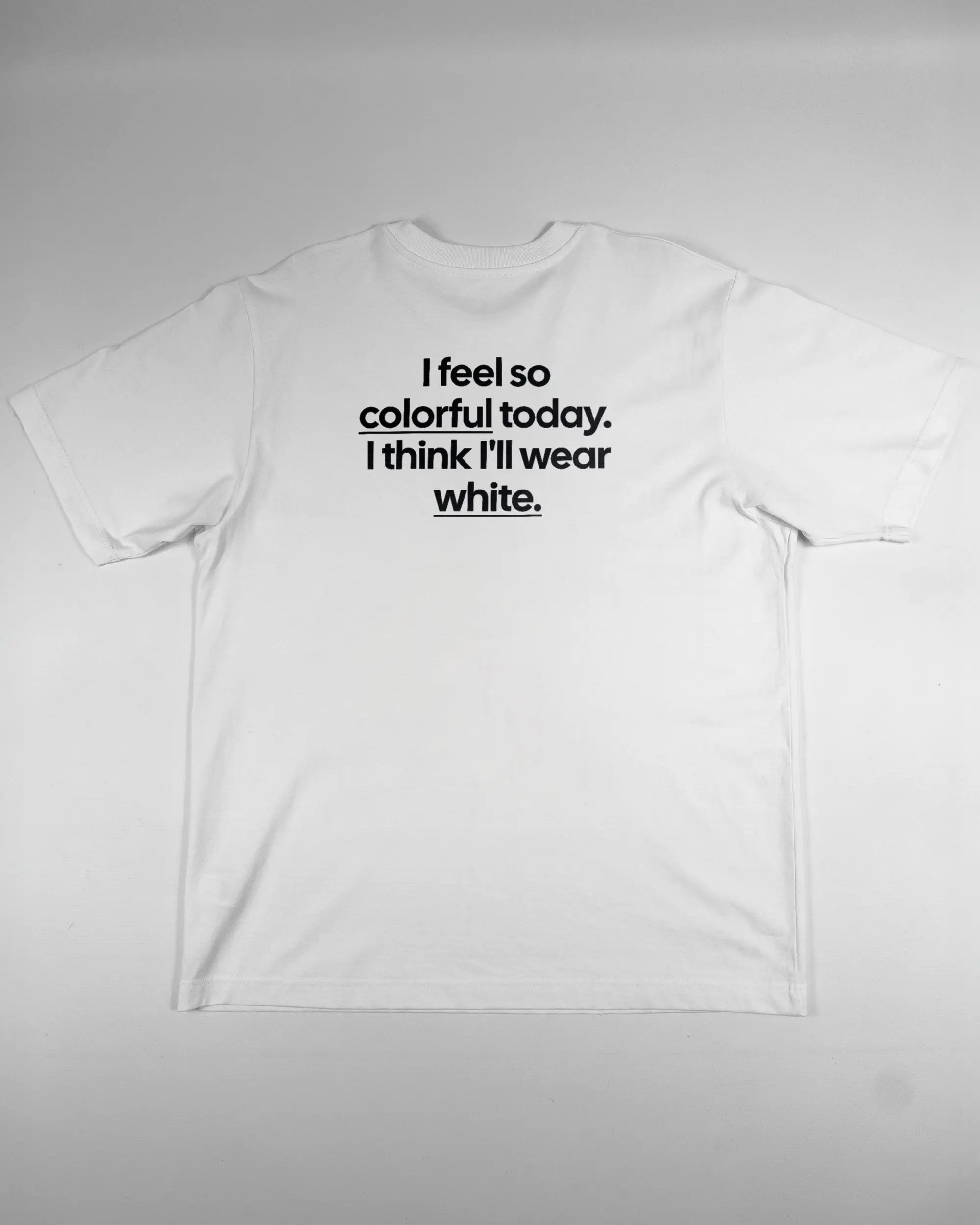 Rückseite des Organic Unisex T-Shirt Heavy Oversized von Maondo mit dem Design Colorful Day in der Farbe White und in der Größe L flach auf den Boden gelegt