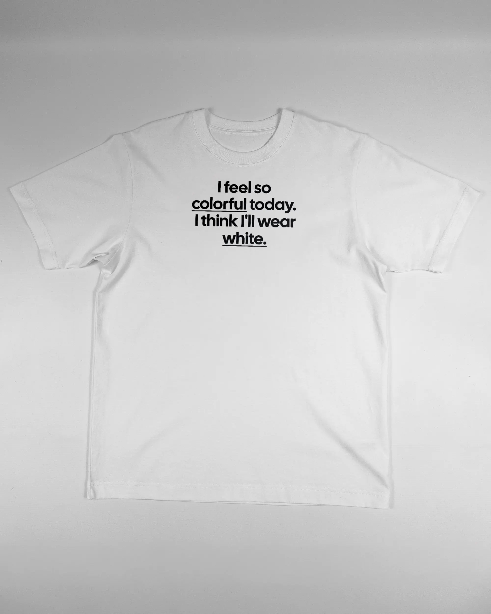 Vorderseite des Organic Unisex T-Shirt Heavy Oversized von Maondo mit dem Design Colorful Day in der Farbe White und in der Größe S flach auf den Boden gelegt