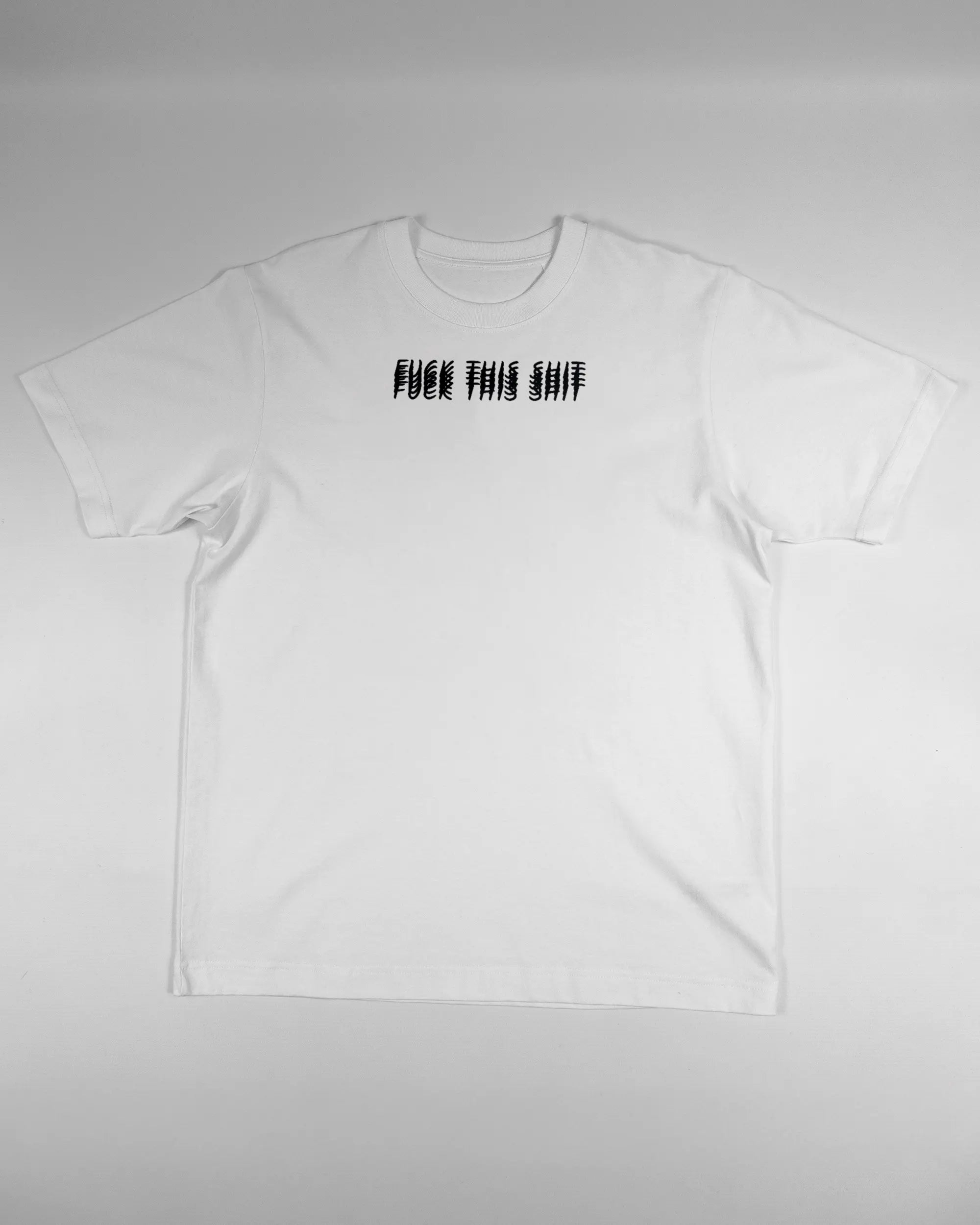 Vorderseite des Organic Unisex T-Shirt Heavy Oversized von Maondo mit dem Design Hidden Message in der Farbe White und in der Größe S flach auf den Boden gelegt