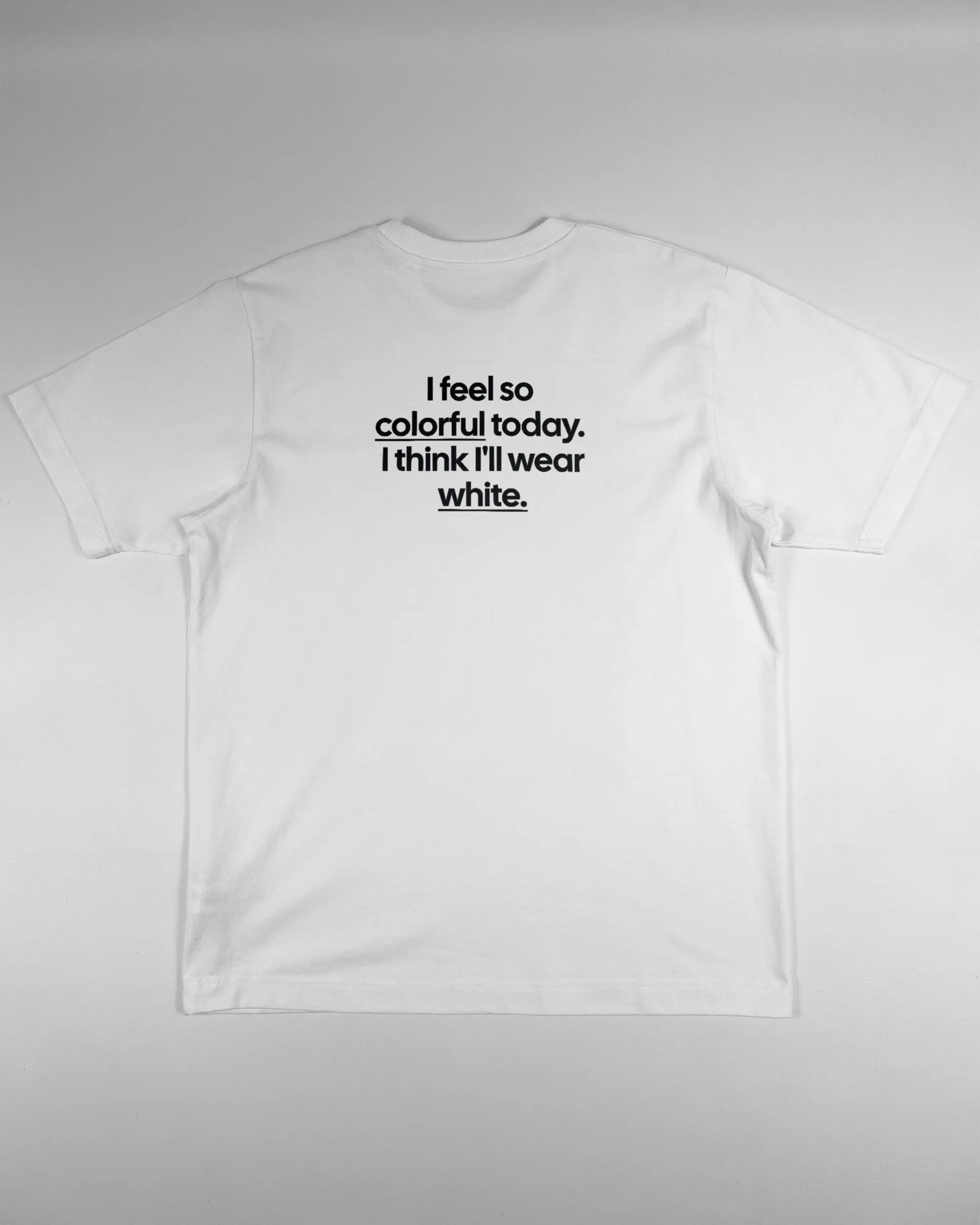 Rückseite des Organic Unisex T-Shirt Heavy Oversized von Maondo mit dem Design Colorful Day in der Farbe White und in der Größe S flach auf den Boden gelegt